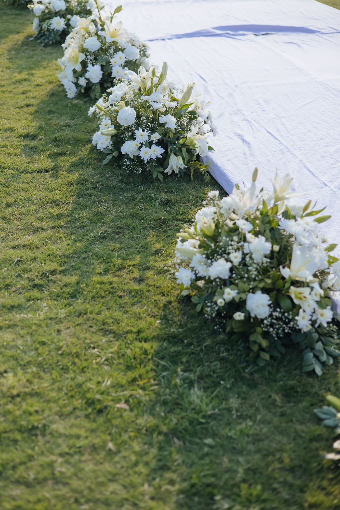 Minimal white floral mandap at Forest Hill for an intimate Indo-Norwegian wedding in Forest Hill, Chandigarh