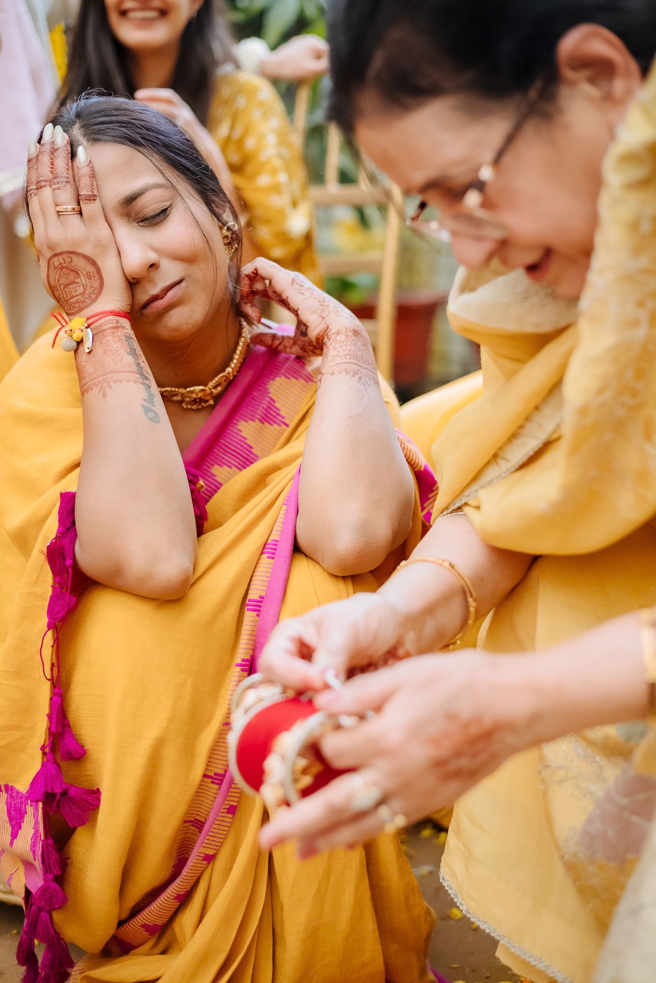 Traditional Punjabi Chooda ceremony captured in a candid storytelling style during an indo-norwegian wedding in Chandigarh