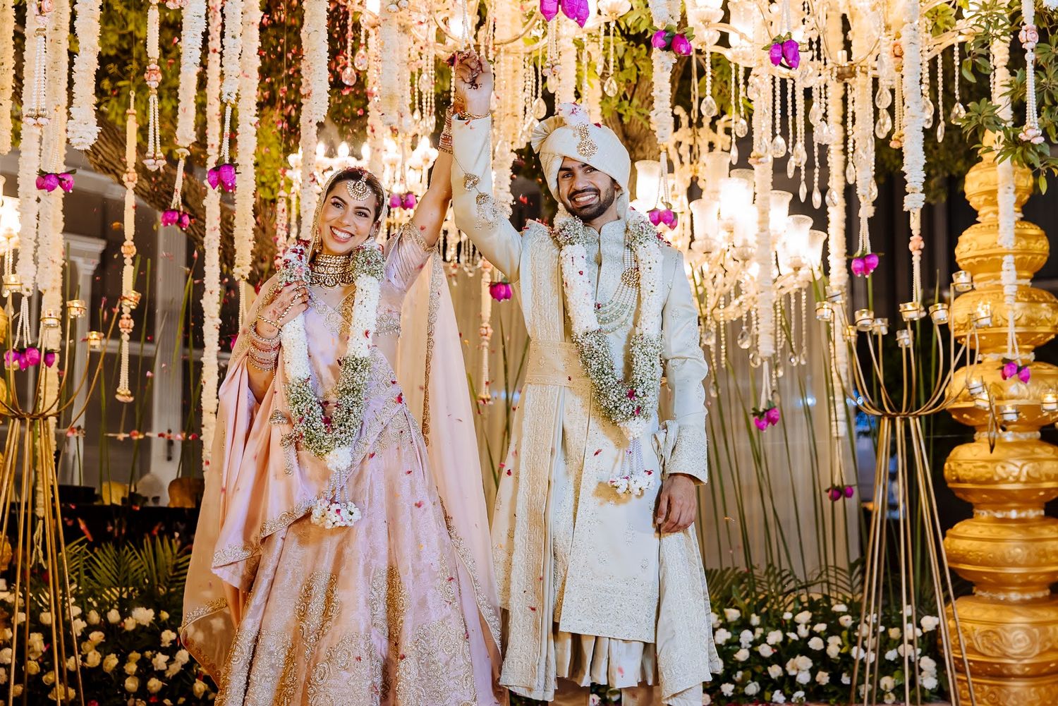 Shorye and Leah during their joyful varmala ceremony at Tivoli Chattarpur