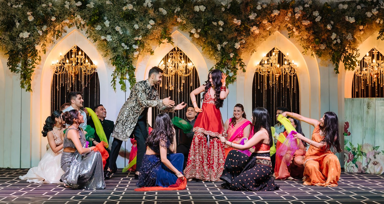 An energetic group dance bringing the Sangeet celebration to life at Tivoli Chattarpur