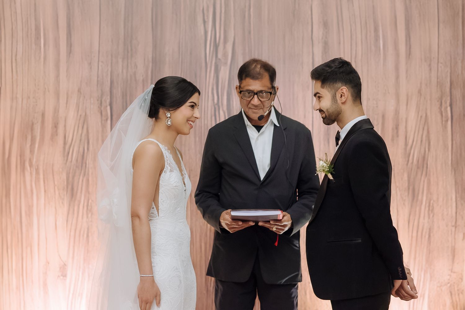 Shorye and Leah sharing an intimate moment during the Christian wedding ceremony at Tivoli Chattarpur