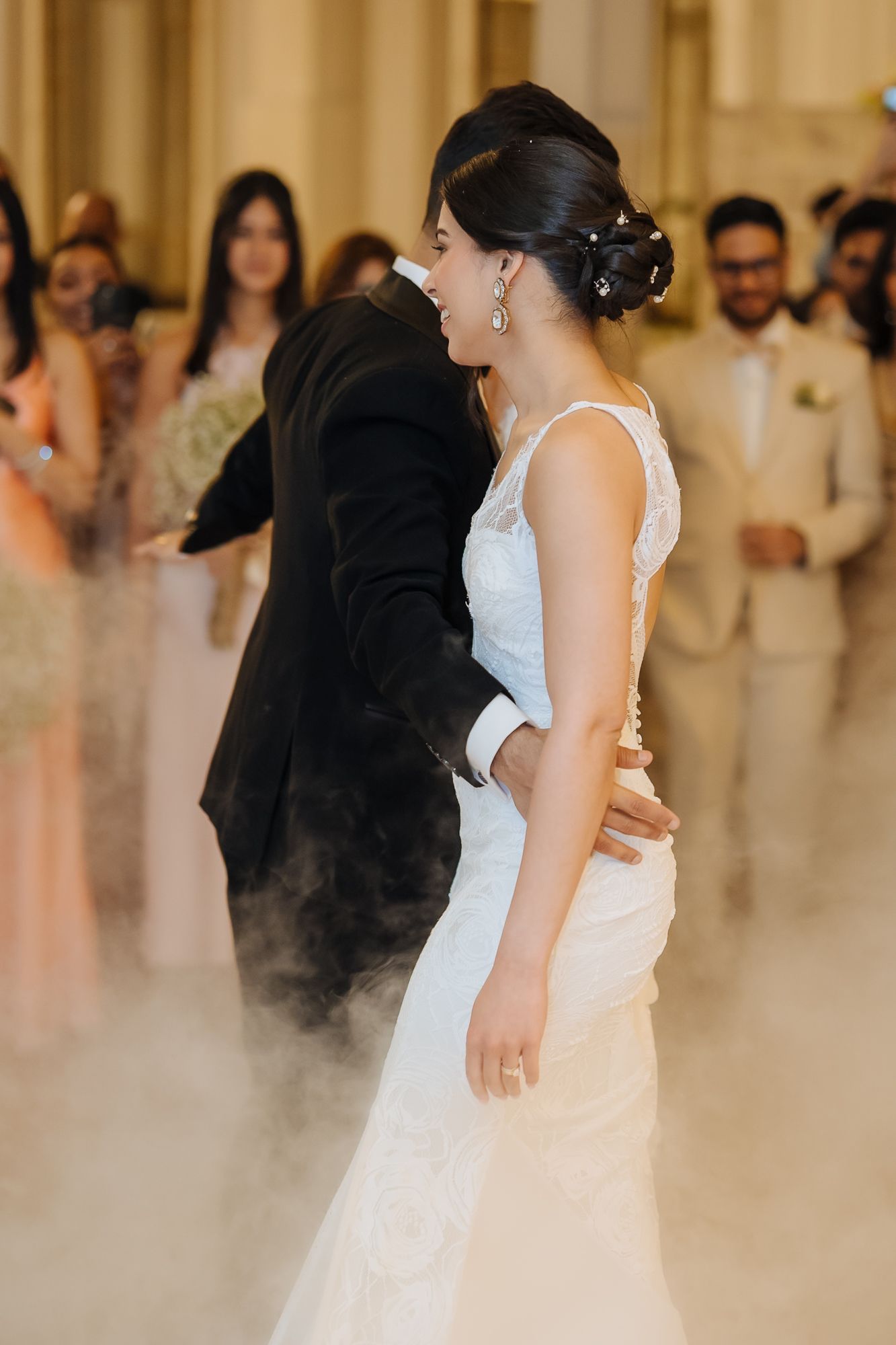 Newlyweds Shorye and Leah enjoying their first dance surrounded by loved ones, after the christian wedding ceremony at Tivoli Chattarpur