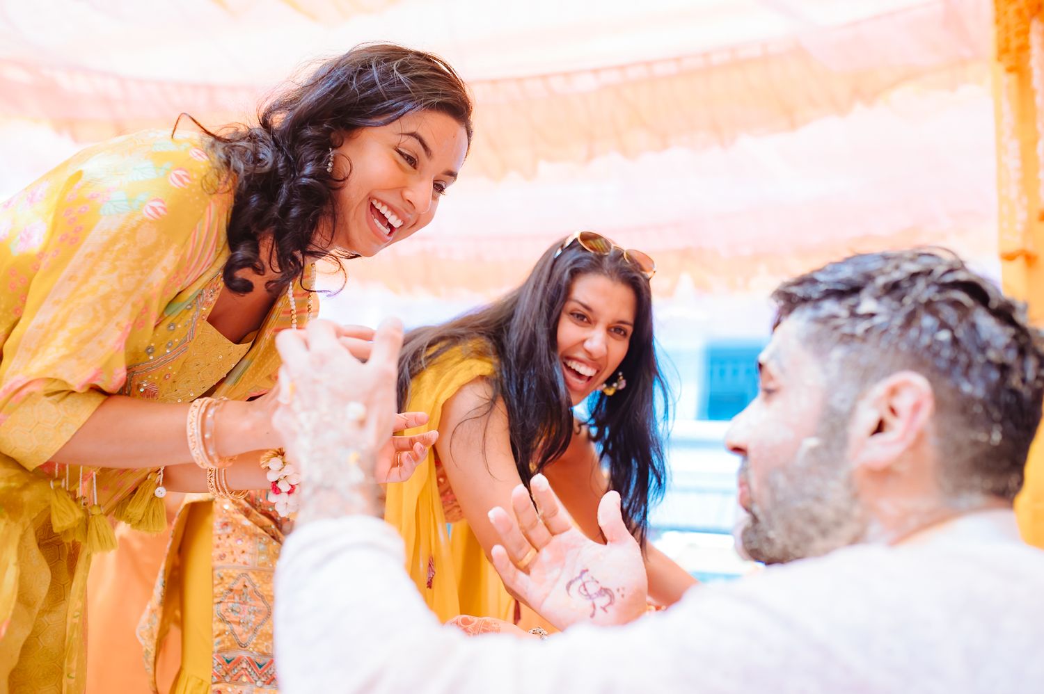 Bride and groom receiving blessings from guests during their Haldi ceremony at Tivoli Chattarpur