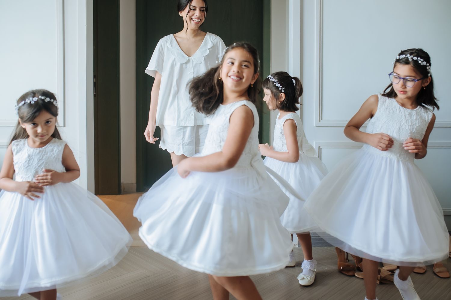Little kid Bridesmaids celebrating with Leah during her wedding morning at Tivoli Chattarpur.
