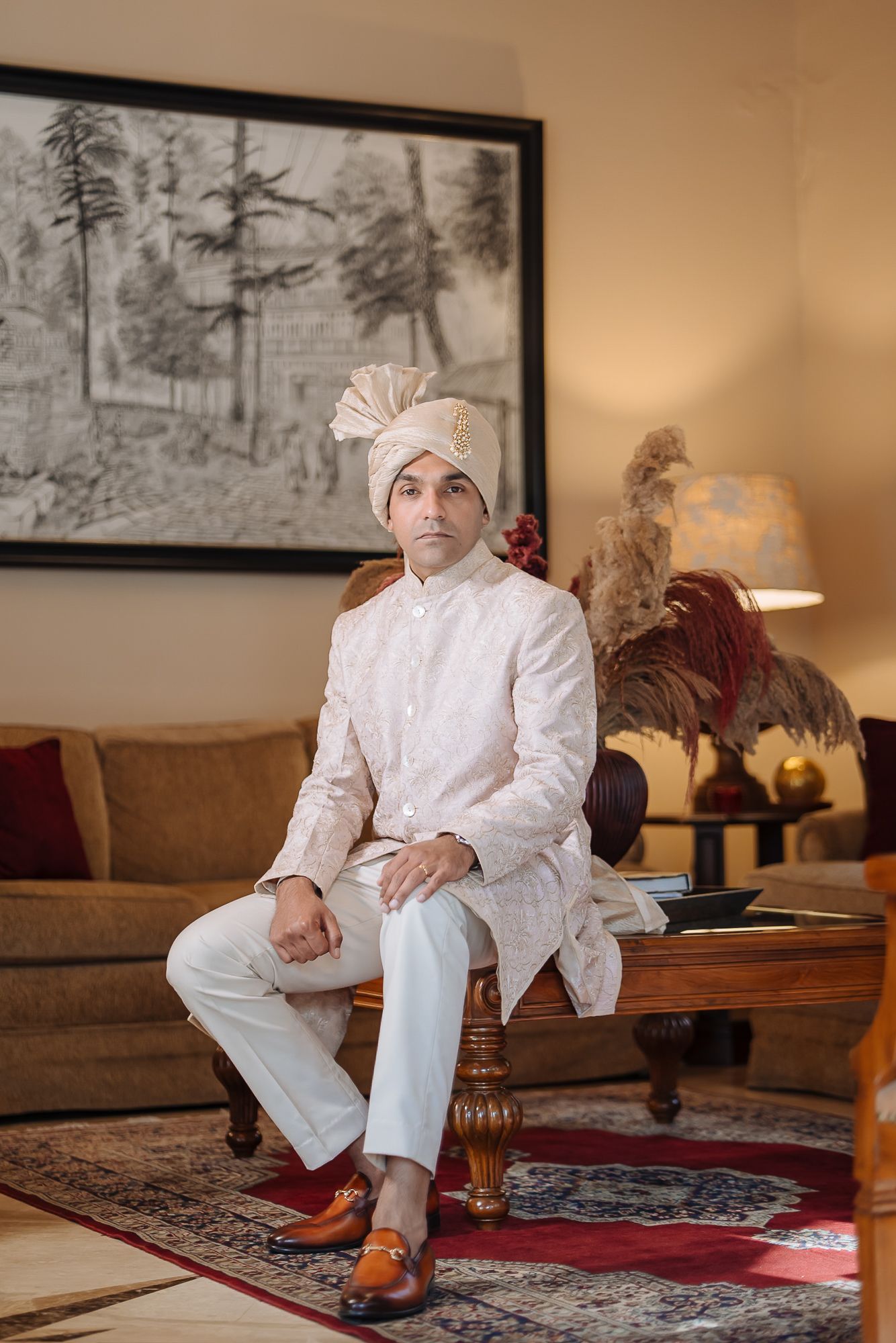 Indian groom in off-white sherwani with fine-art portraits for an intimate wedding of 30 people in the hills at Daleside Manor, Kasauli