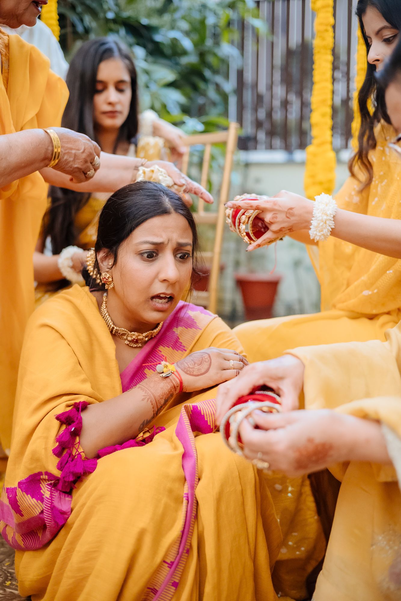 Traditional Punjabi Chooda ceremony captured in a candid storytelling style during an indo-norwegian wedding in Chandigarh