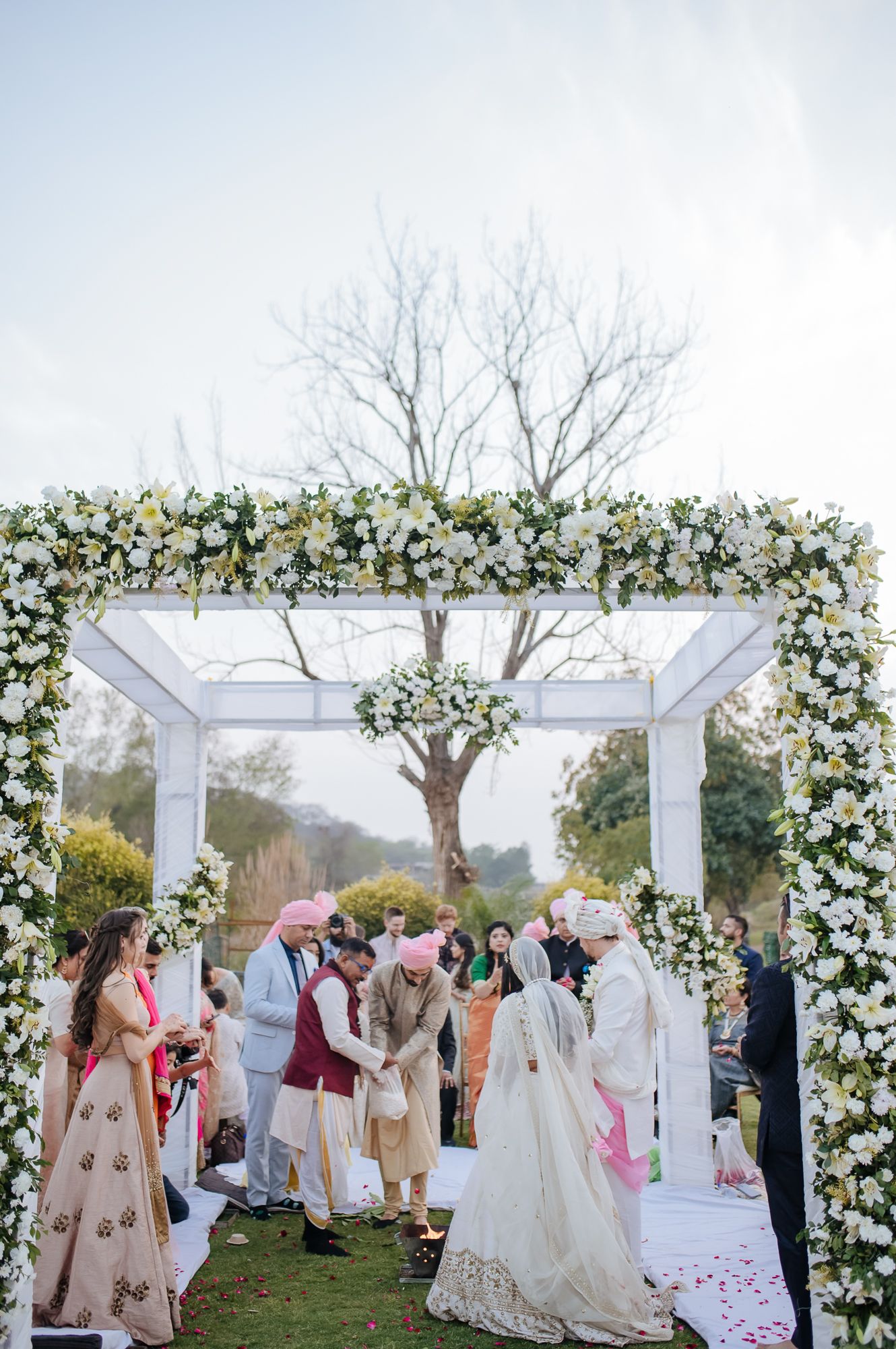 Storytelling wedding photograph capturing an intimate indo-norwegian fusion wedding ceremony at Forest Hill Chandigarh