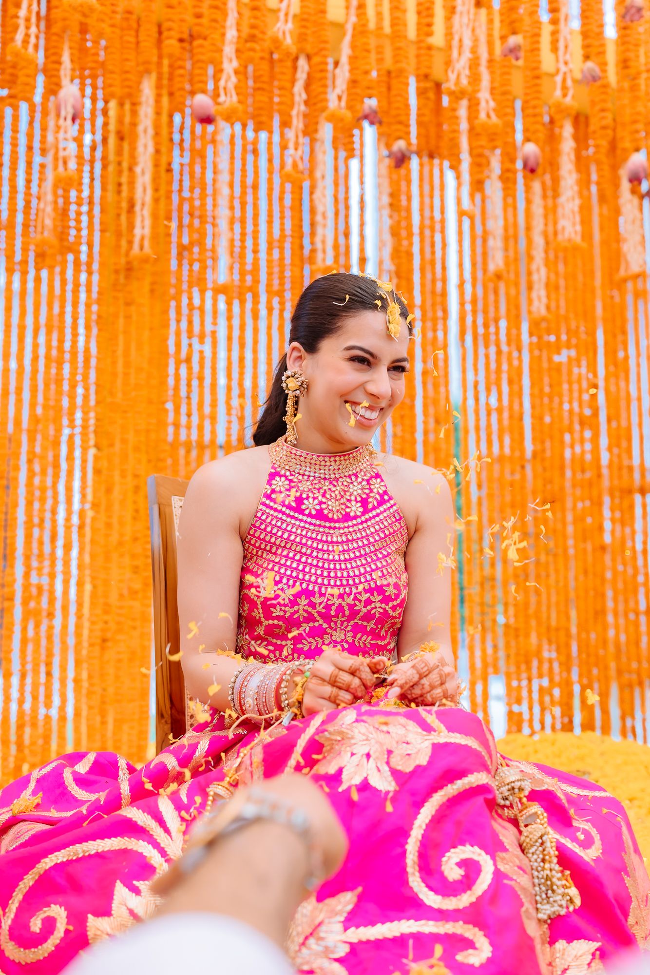 Leah embracing Punjabi bridal traditions during her chooda ceremony at Tivoli Chattarpur