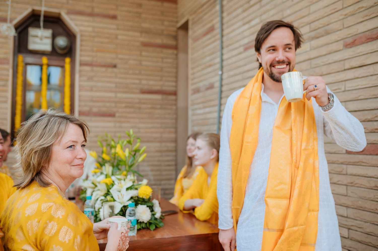 friends and family arriving for the Haldi celebration  for an Indo-Norwegian wedding of Mats and Itisha in Chandigarh