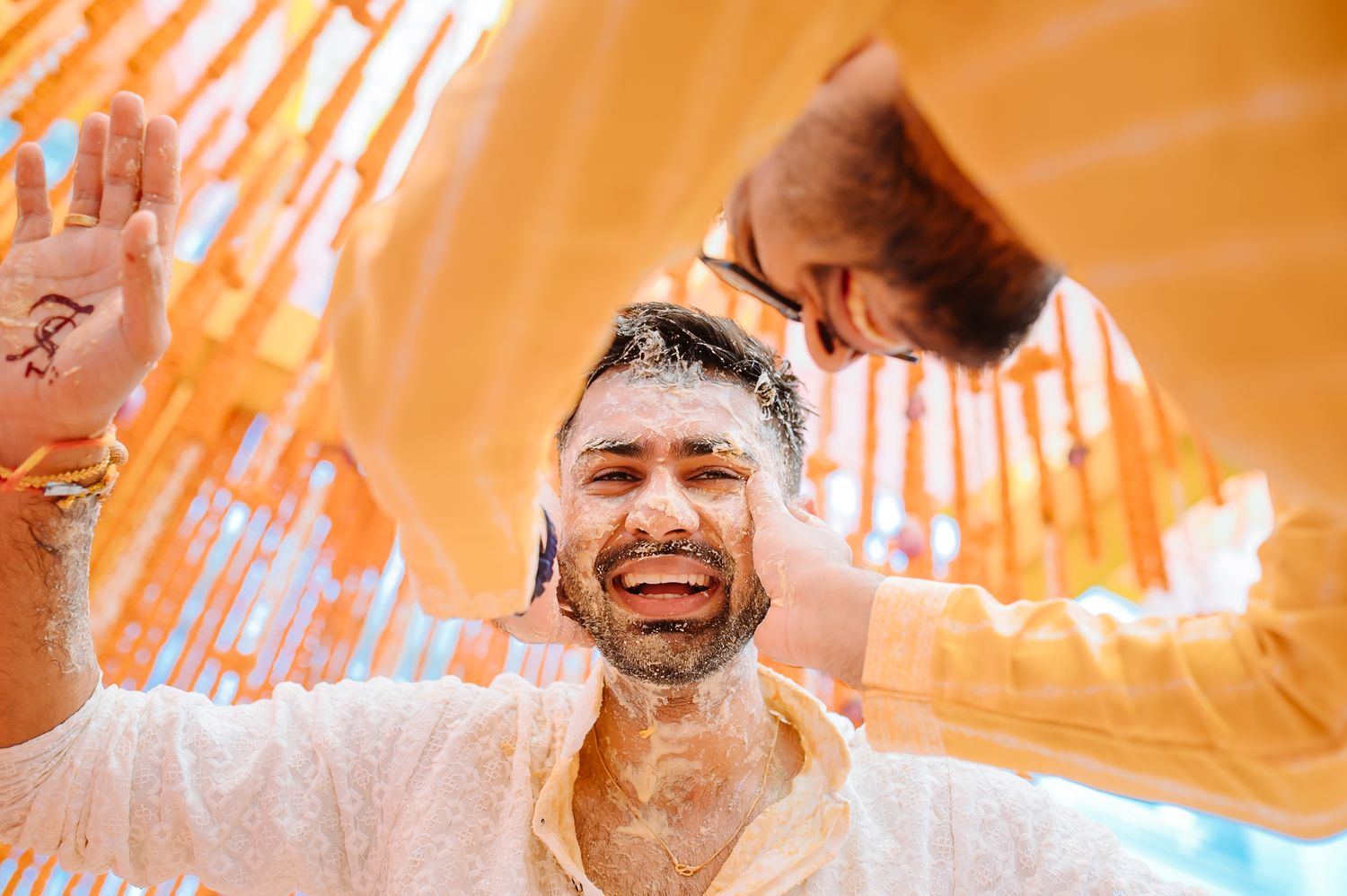 Candid moments of laughter and celebration at Shorye and Leah’s Haldi at Tivoli Chattarpur