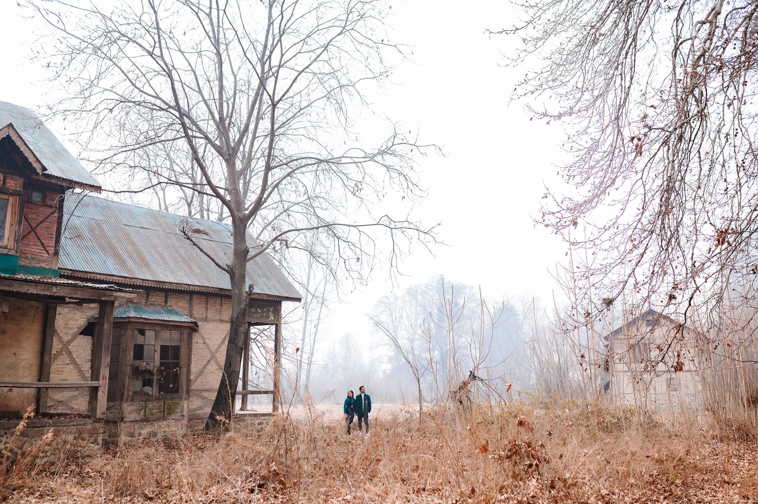 Intimate pre-wedding couple portrait with nostalgic fine-art style at a hidden secret spot in Srinagar