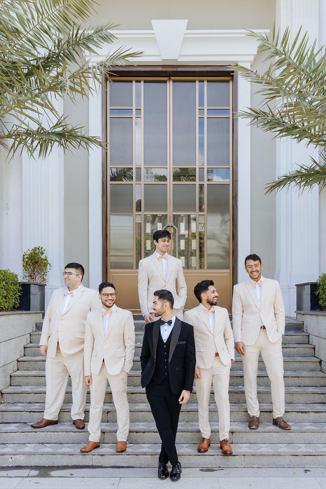 Groomsmen reacting as Shorye gets ready for his wedding at Tivoli Chattarpur.