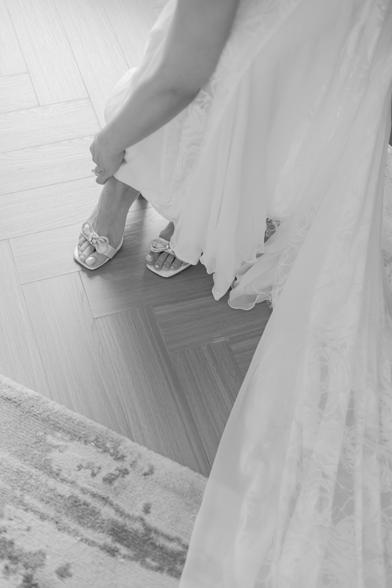 Bride Leah preparing for her Christian wedding in white at Tivoli Chattarpur.