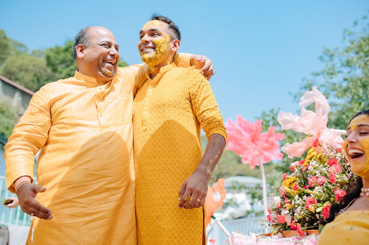 Colorful and candid Haldi moments captured by Fine-art and candid Indian wedding photography and films team Beginnings For You.