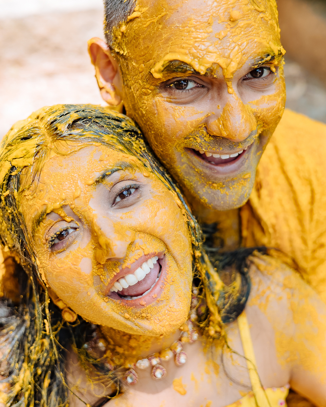 Colorful and candid Haldi couple portraits captured by Fine-art and candid Indian wedding photography and films team Beginnings For You.