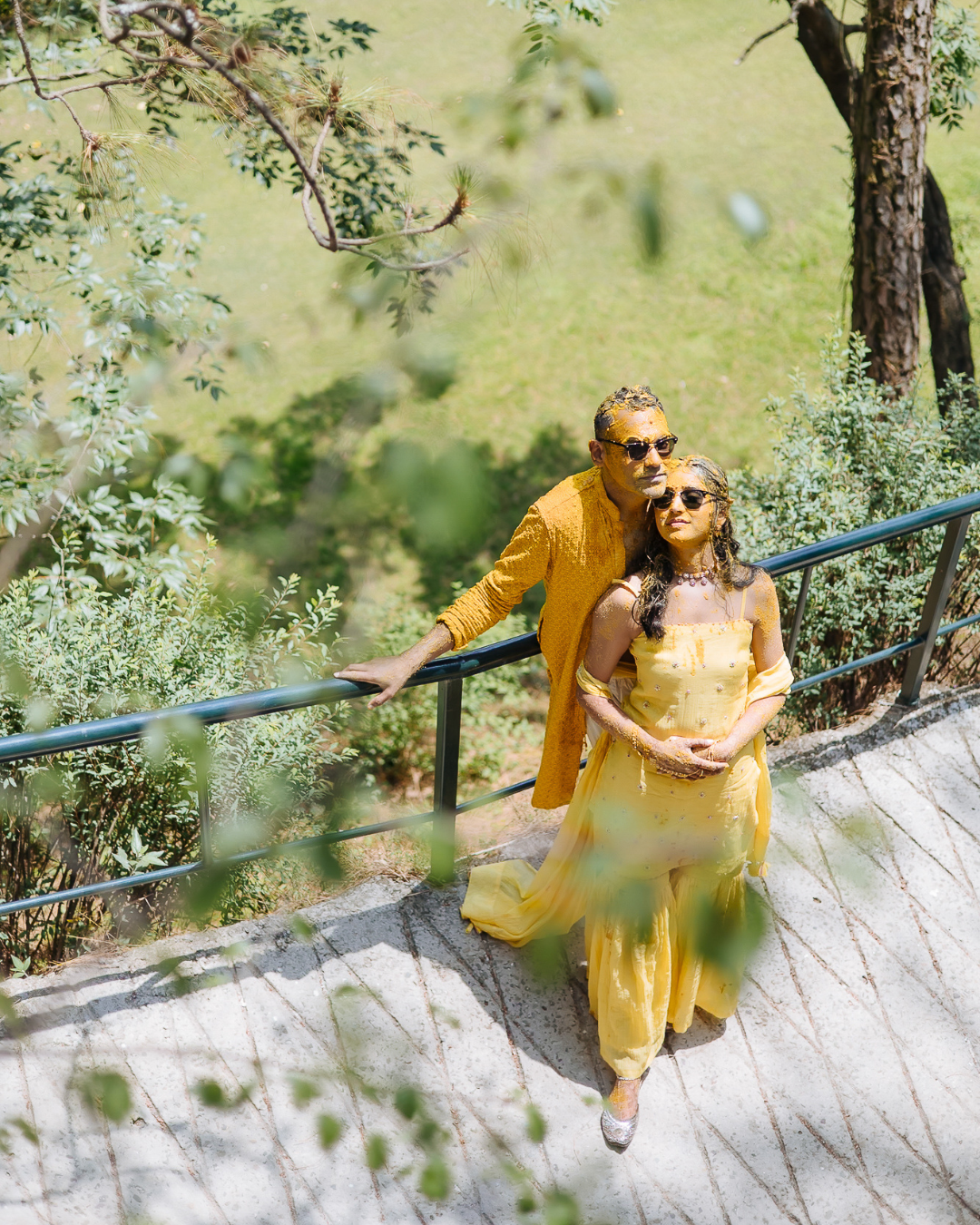 Colorful and candid Haldi couple portraits captured by Fine-art and candid Indian wedding photography and films team Beginnings For You.