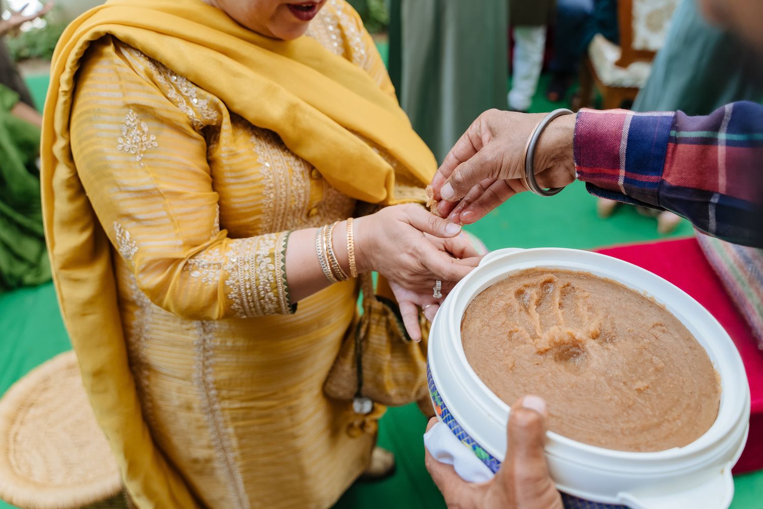 Laughter and candid moments during a luxury intimate Mehendi ceremony