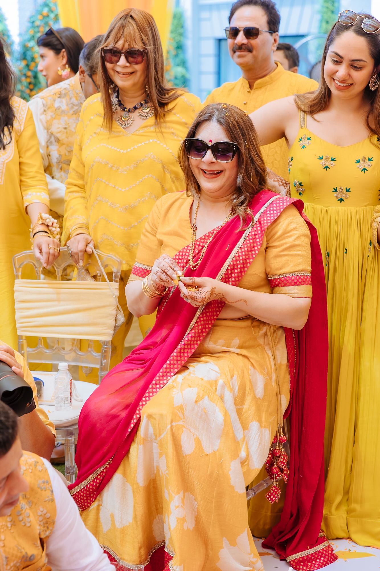 Family blessing bride Leah during her traditional chooda ceremony at Tivoli Chattarpur