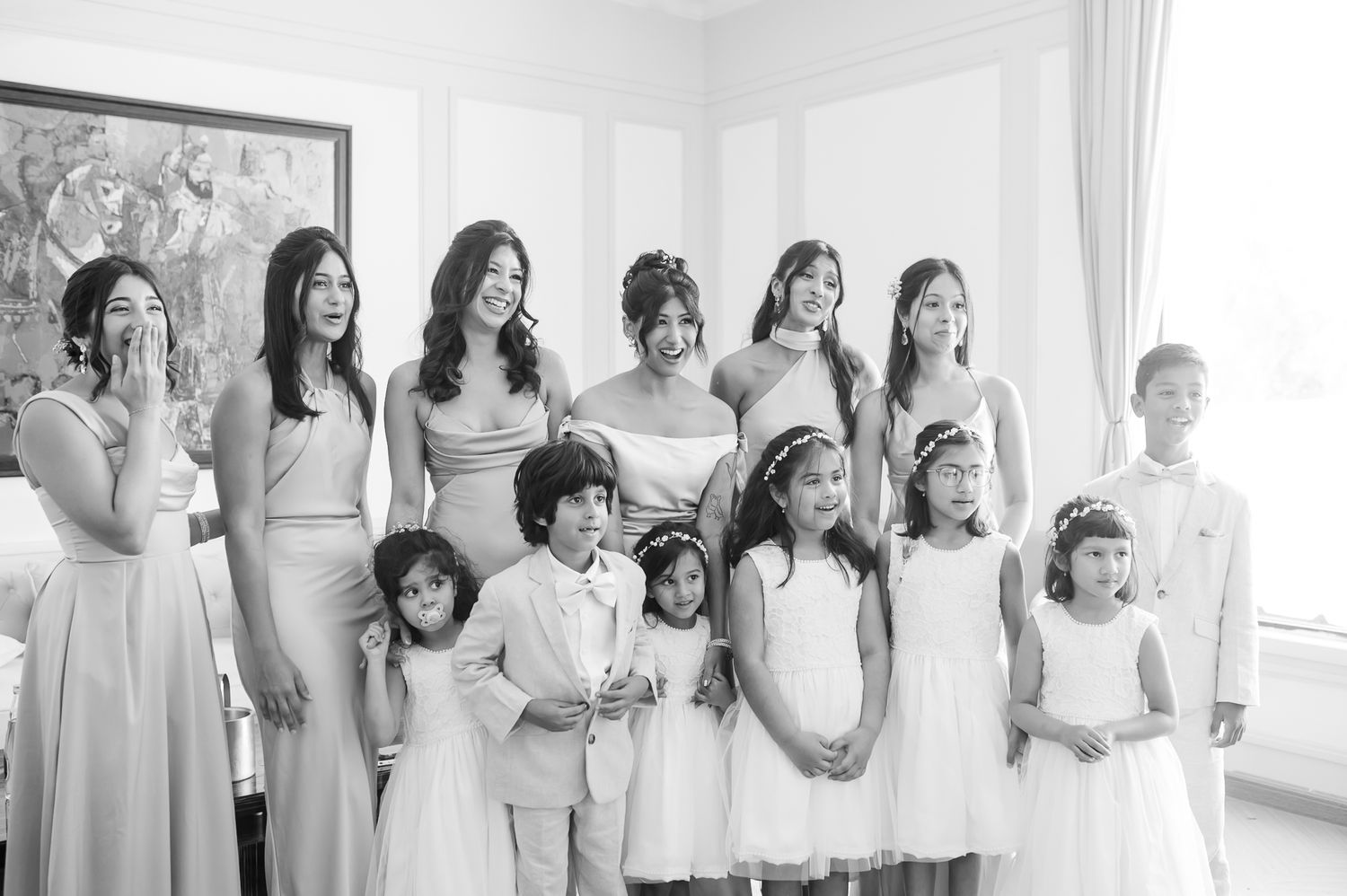 Leah sharing a joyful moment with her bridesmaids before the Christian wedding at Tivoli Chattarpur.