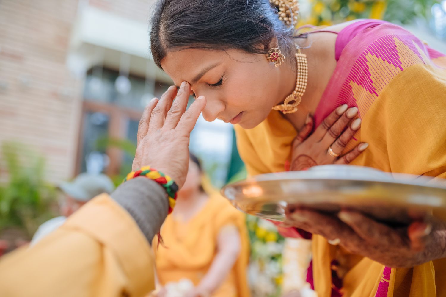 Traditional Punjabi Chooda ceremony captured in a candid storytelling style during an indo-norwegian wedding in Chandigarh