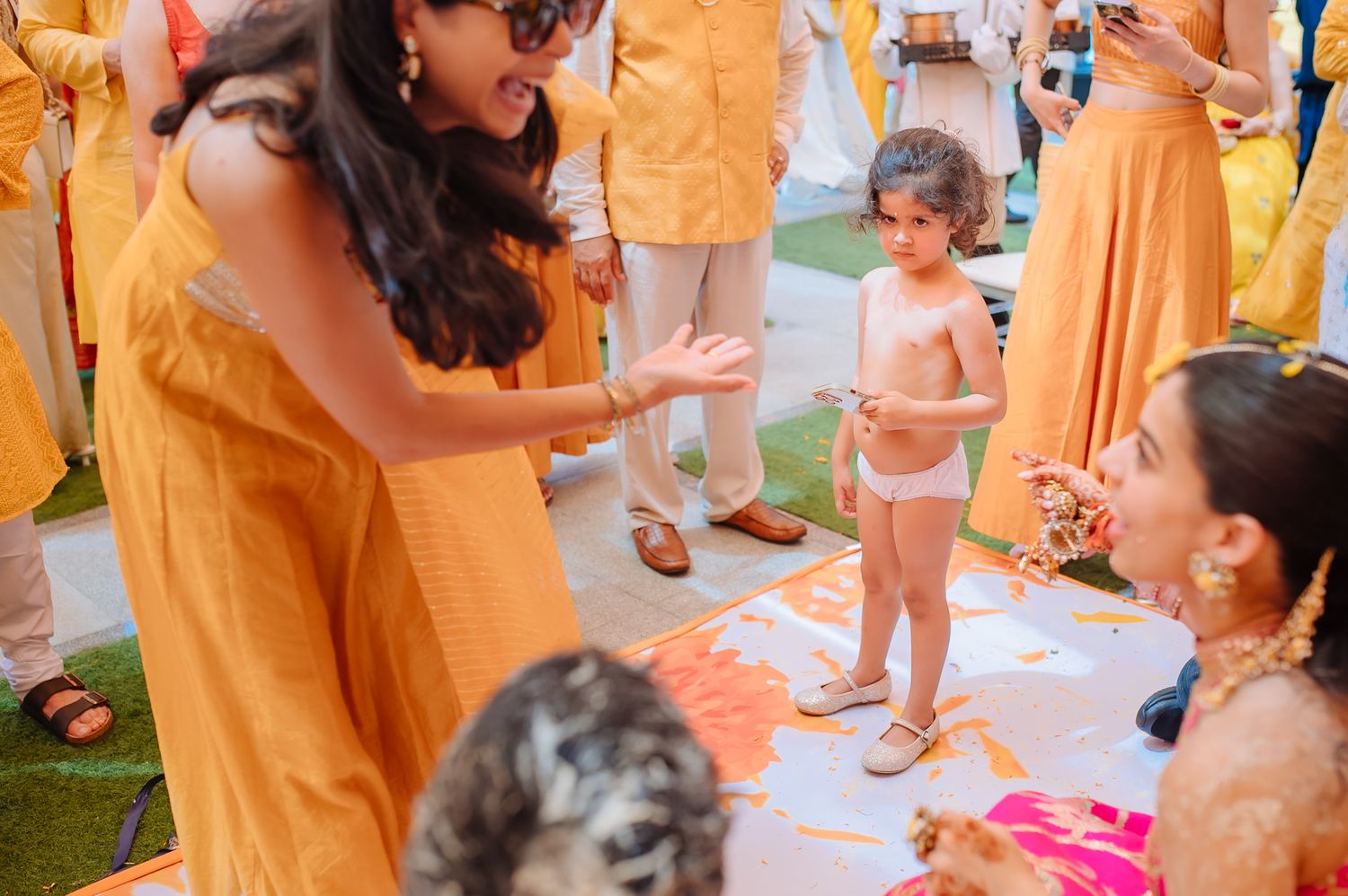 Shorye and Leah sharing intimate moments with loved ones during their Haldi at Tivoli Chattarpur