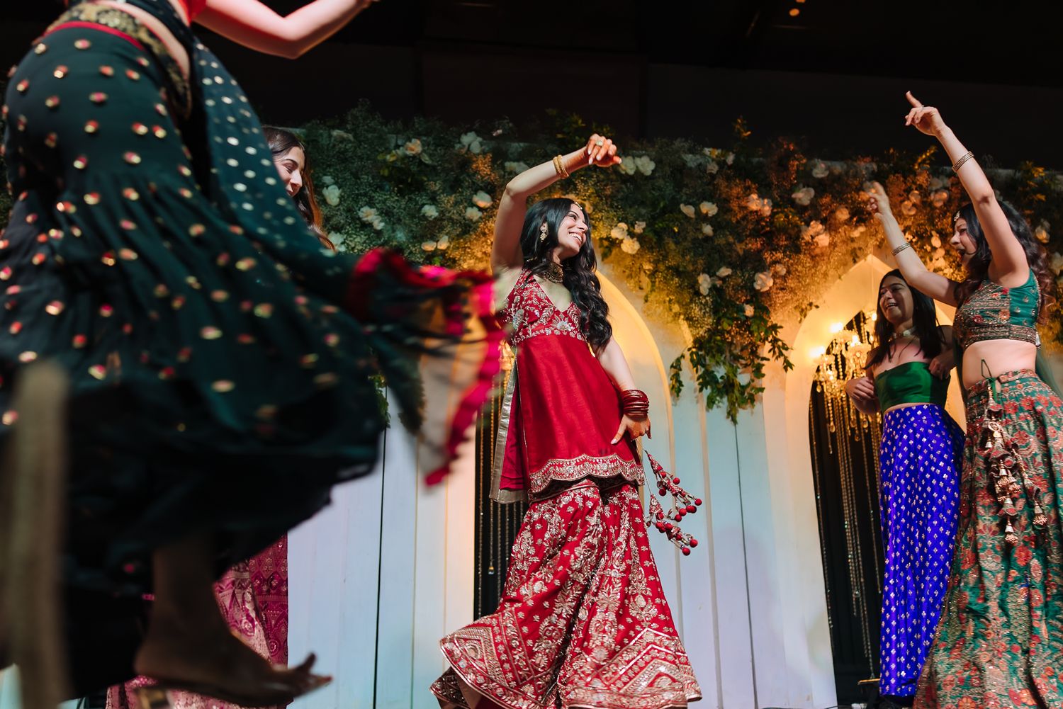 An energetic group dance bringing the Sangeet celebration to life at Tivoli Chattarpur