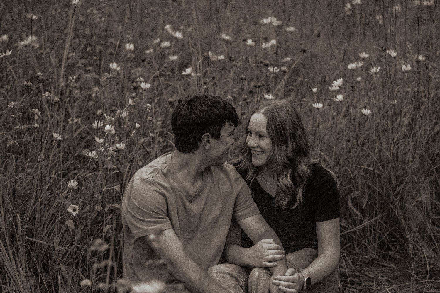 couple smiling for photographer