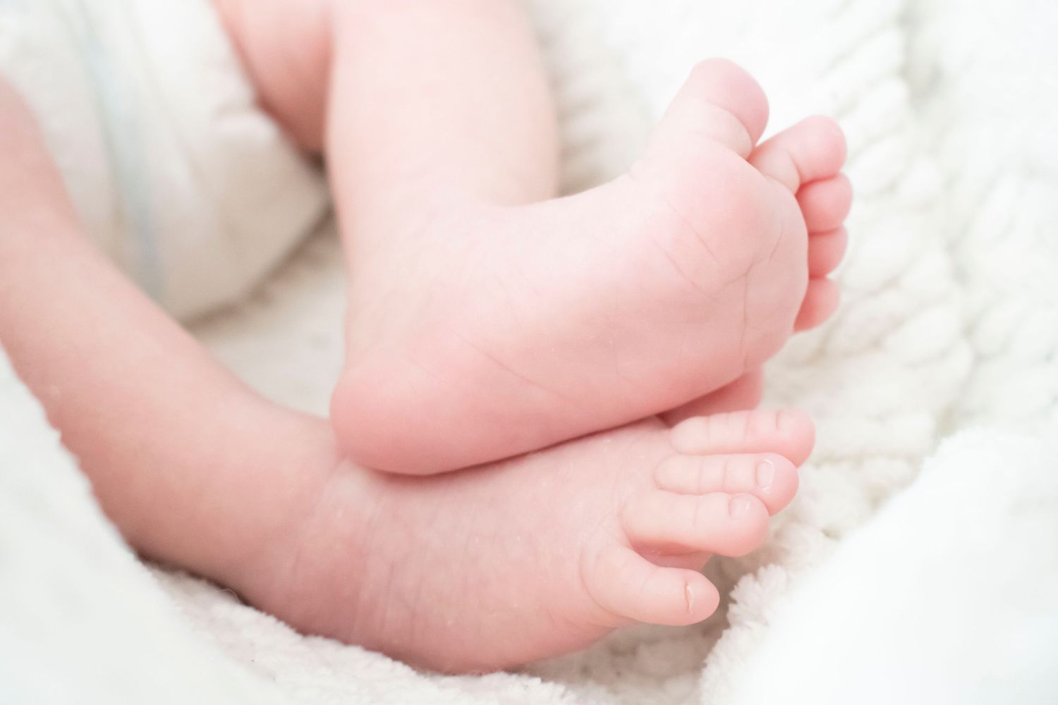 newborn photography session with sleeping candid moment