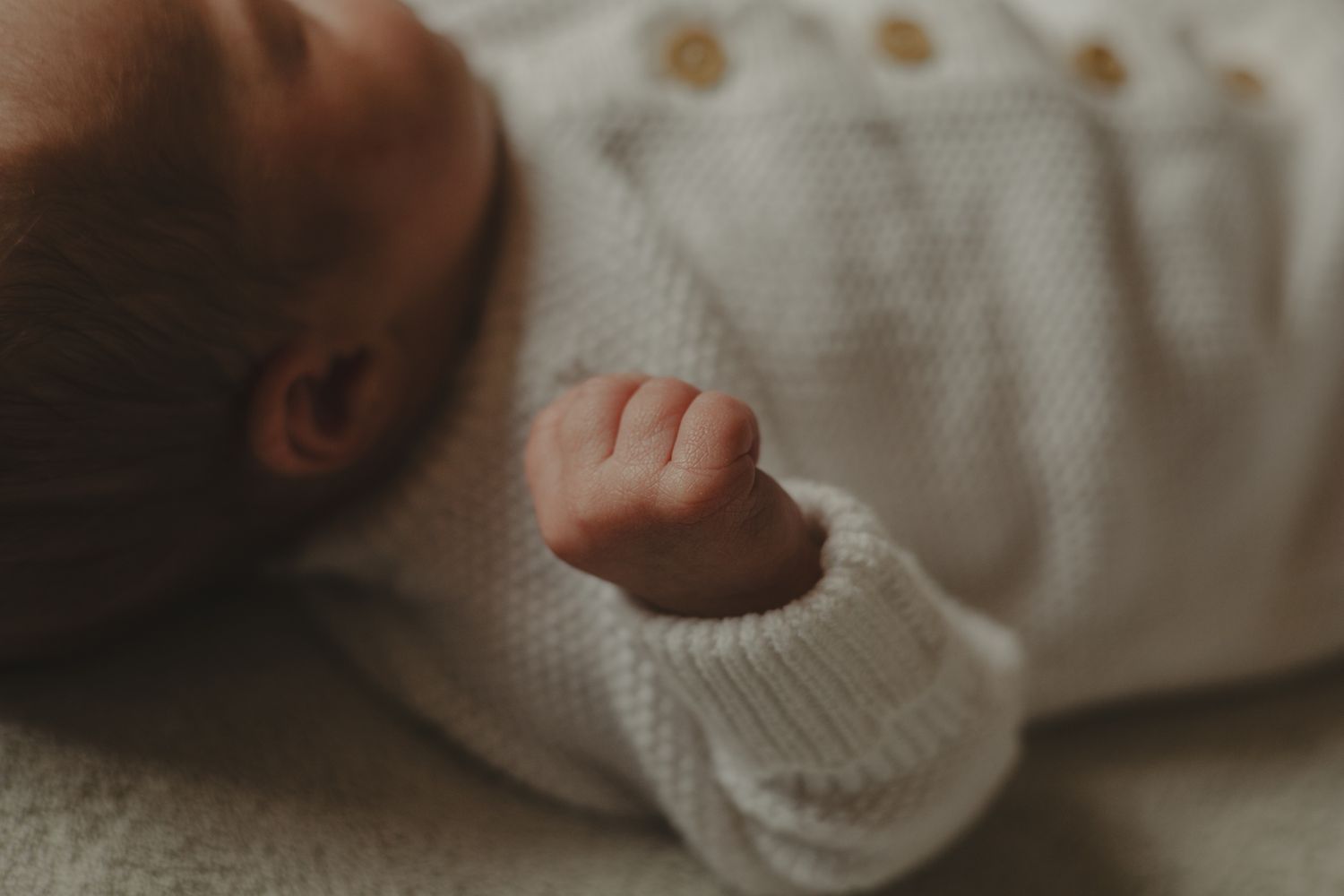 Babies hand during newborn shoot in Shropshire.