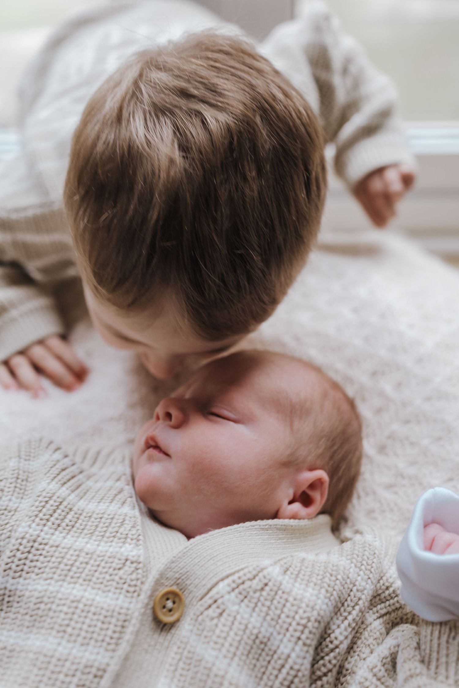 Brothers love, newborn family photoshoot in Shrewsbury.