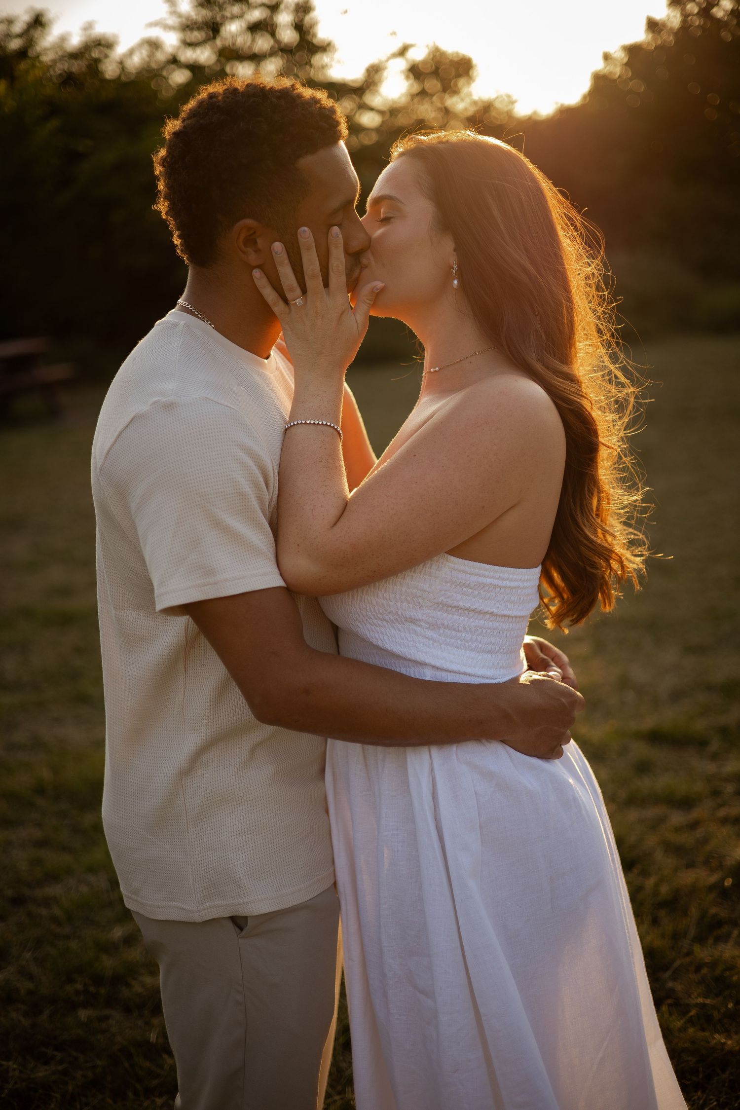 Couple kissing during their engagement shoot in Shropshire
