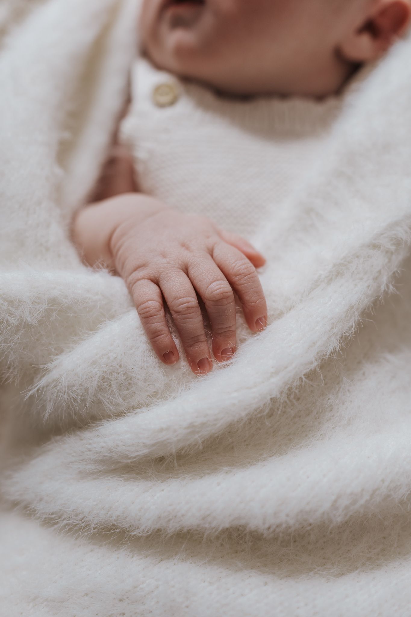 Baby hand during newborn photoshoot