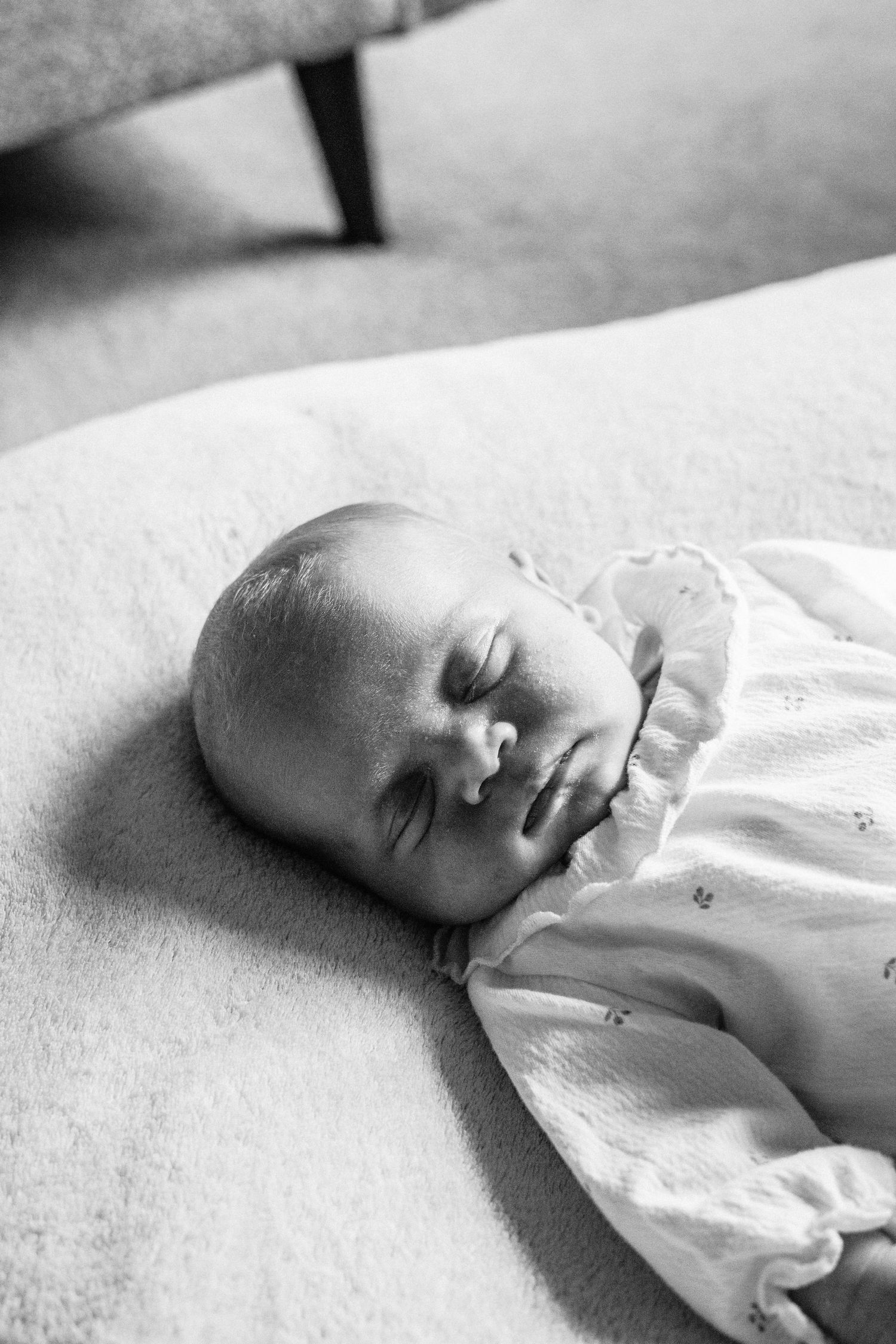 Baby girl during newborn shoot in Telford.