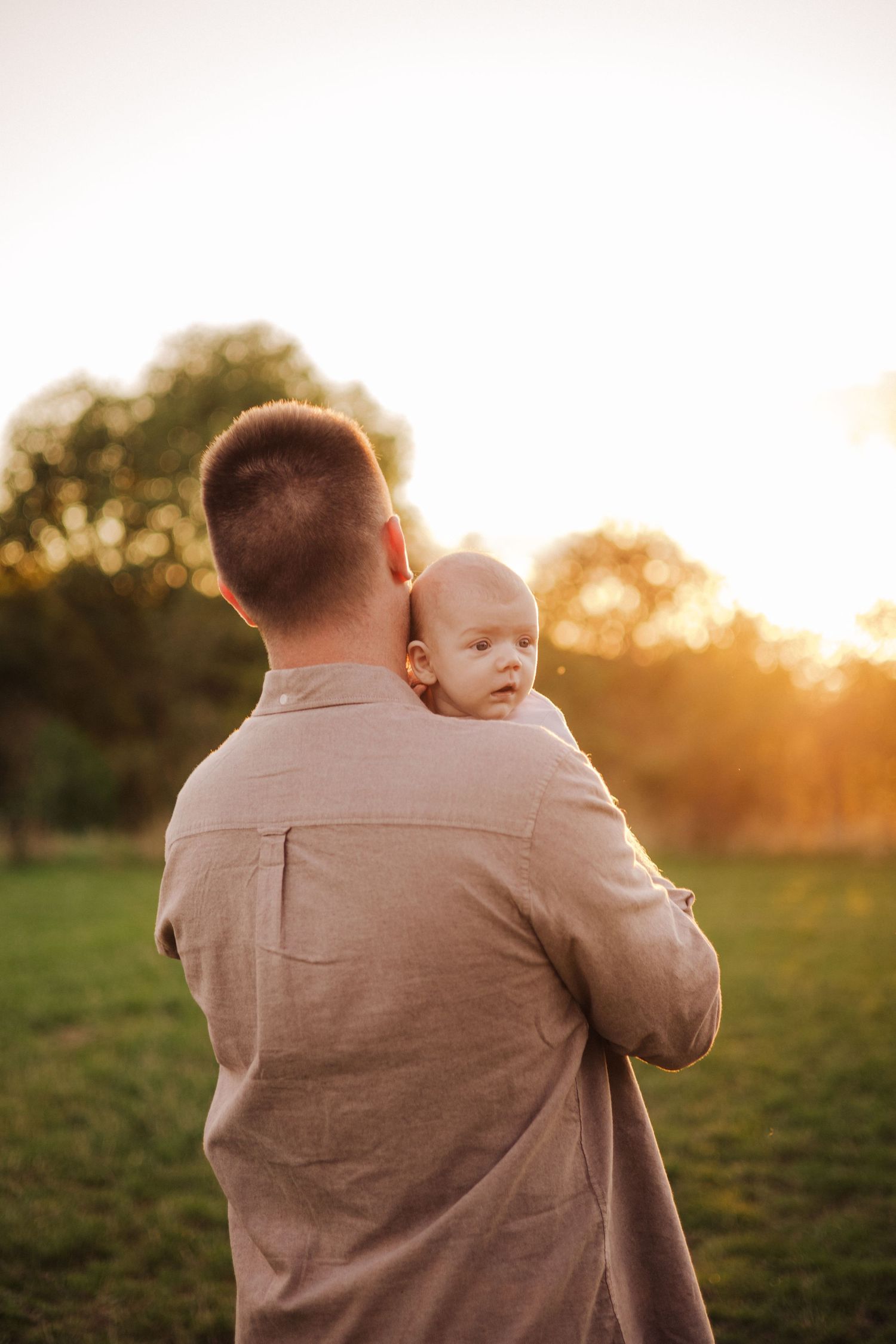 Dad and baby during newborn shoot in Telford