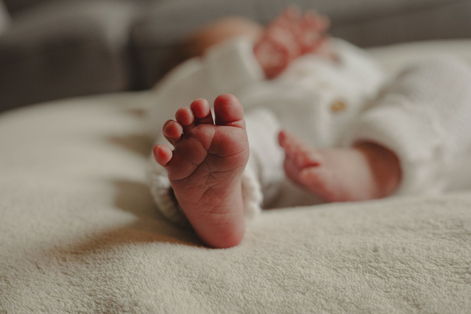 Photo of a newborn babies toes during newborn photography session in Telford.