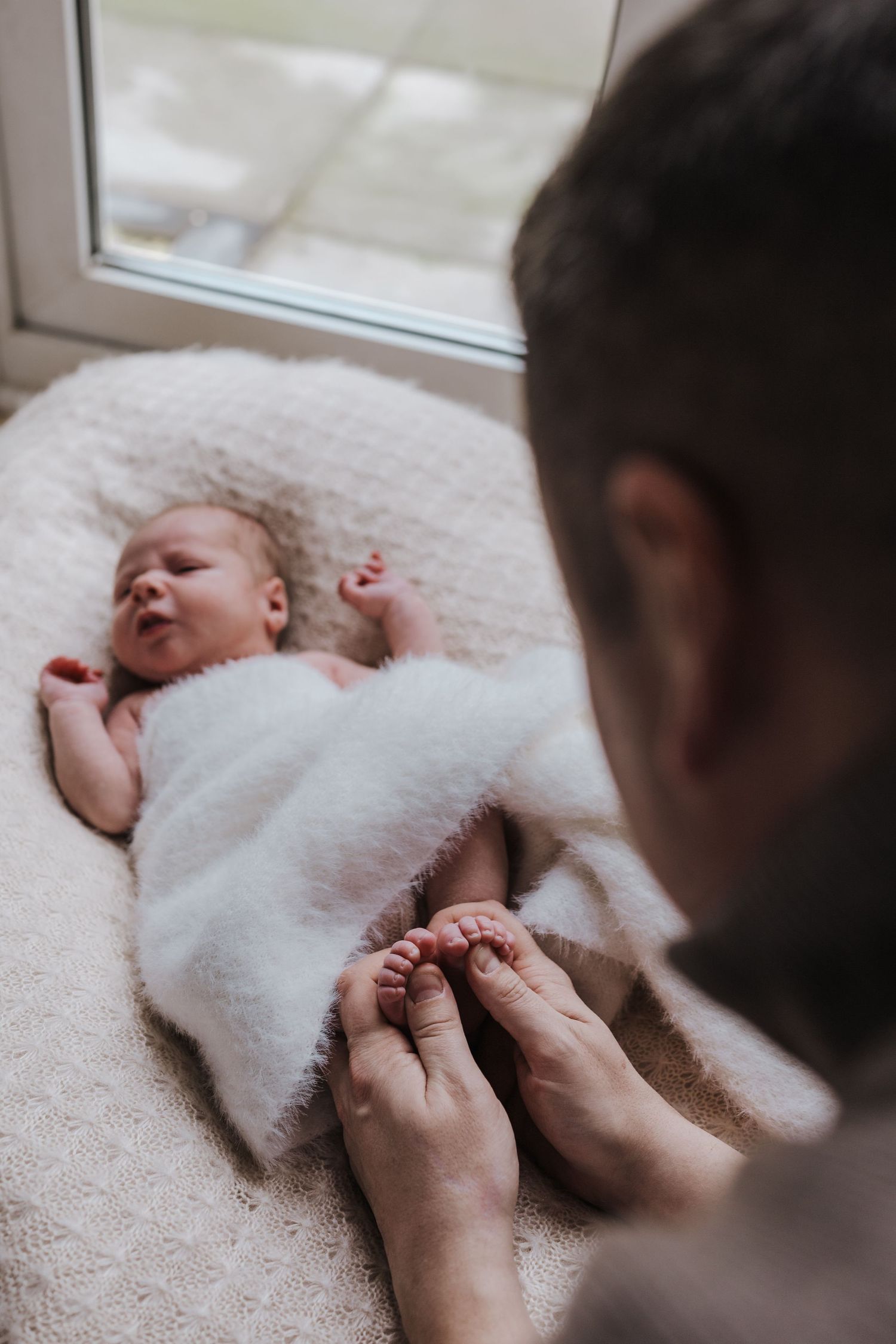 Newborn family photoshoot in Shrewsbury.