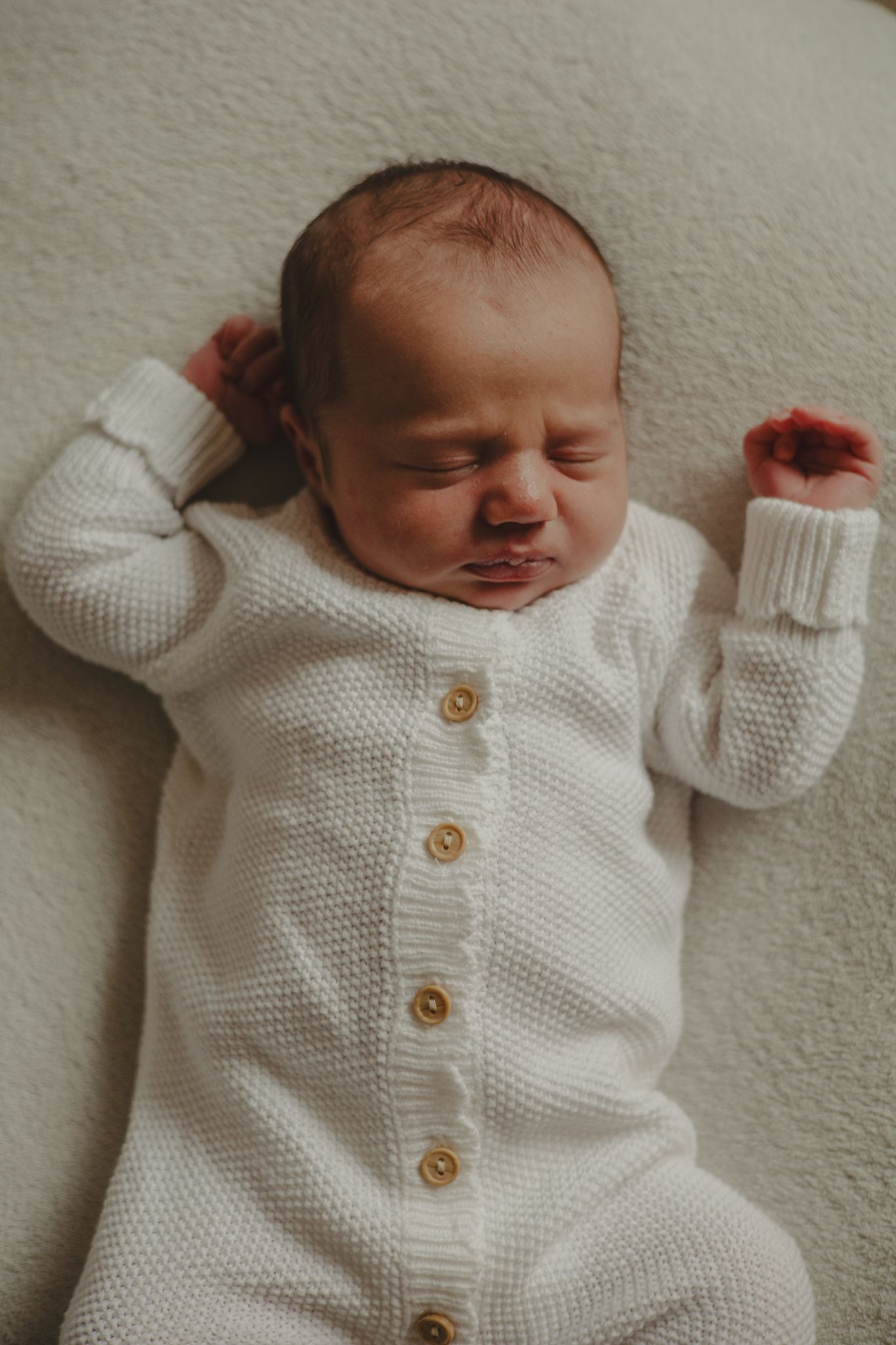 Photo of a newborn baby asleep during newborn photography session in Telford.