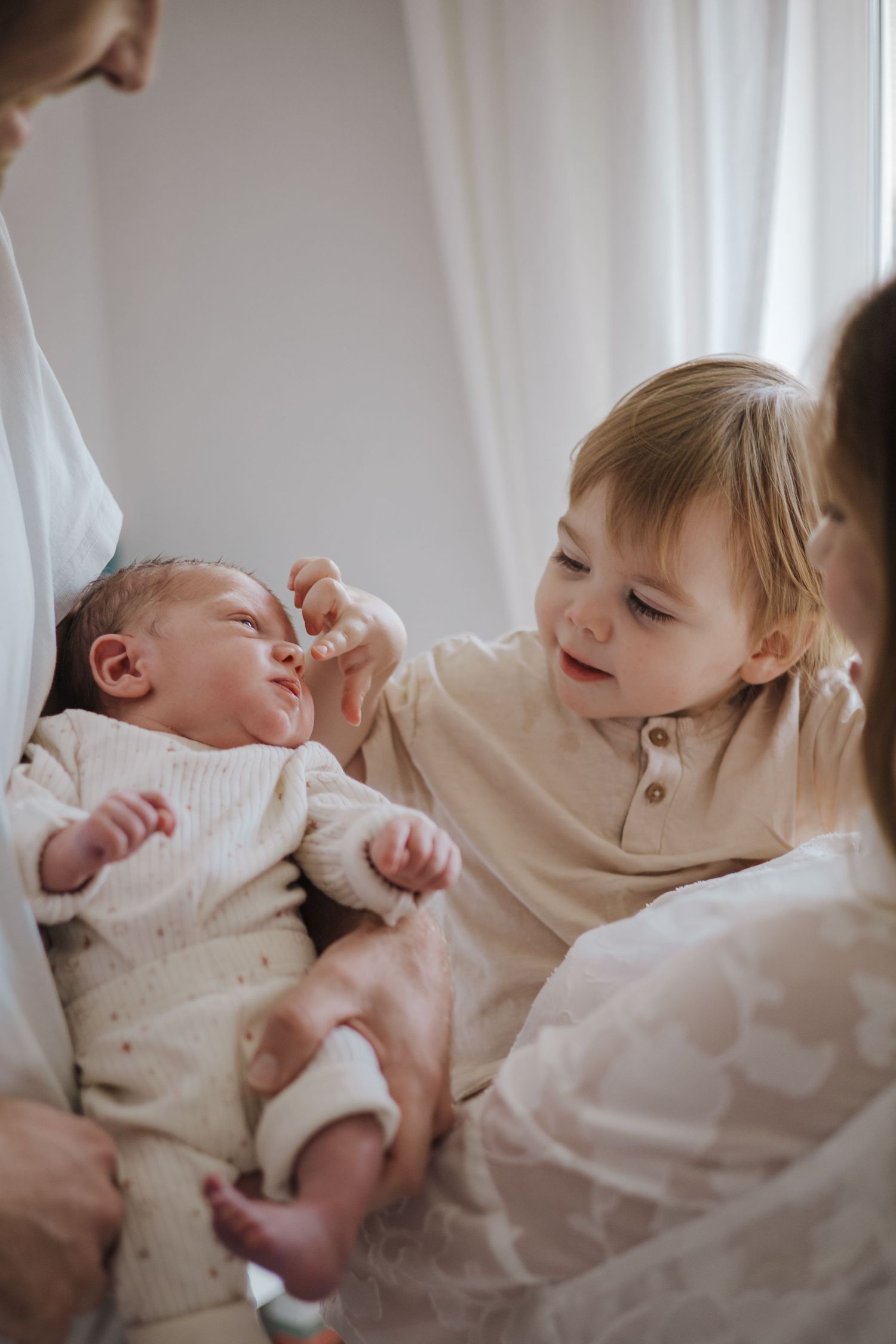 A family of four during an at home photoshoot in Telford.