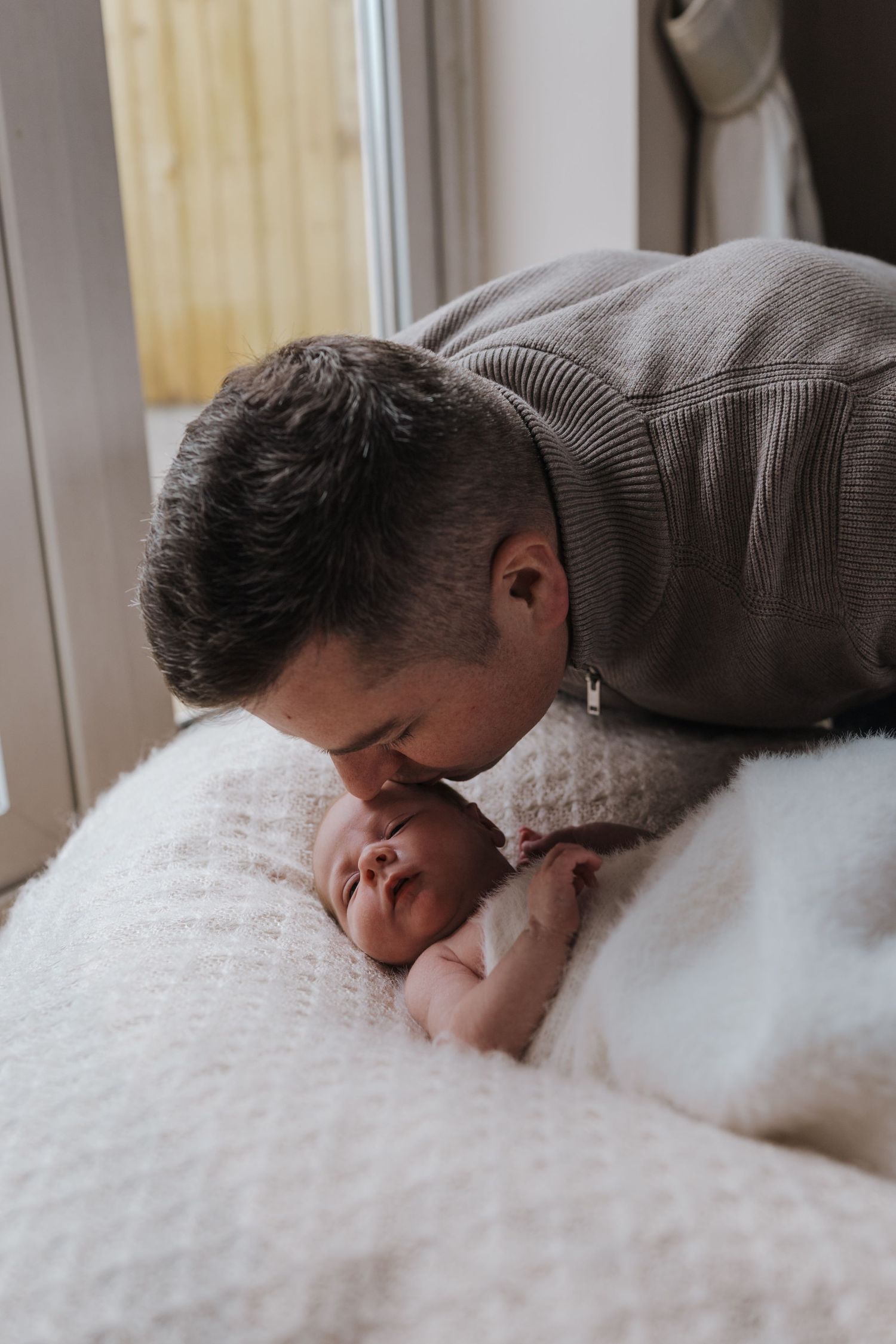 Newborn family photoshoot in Shrewsbury.