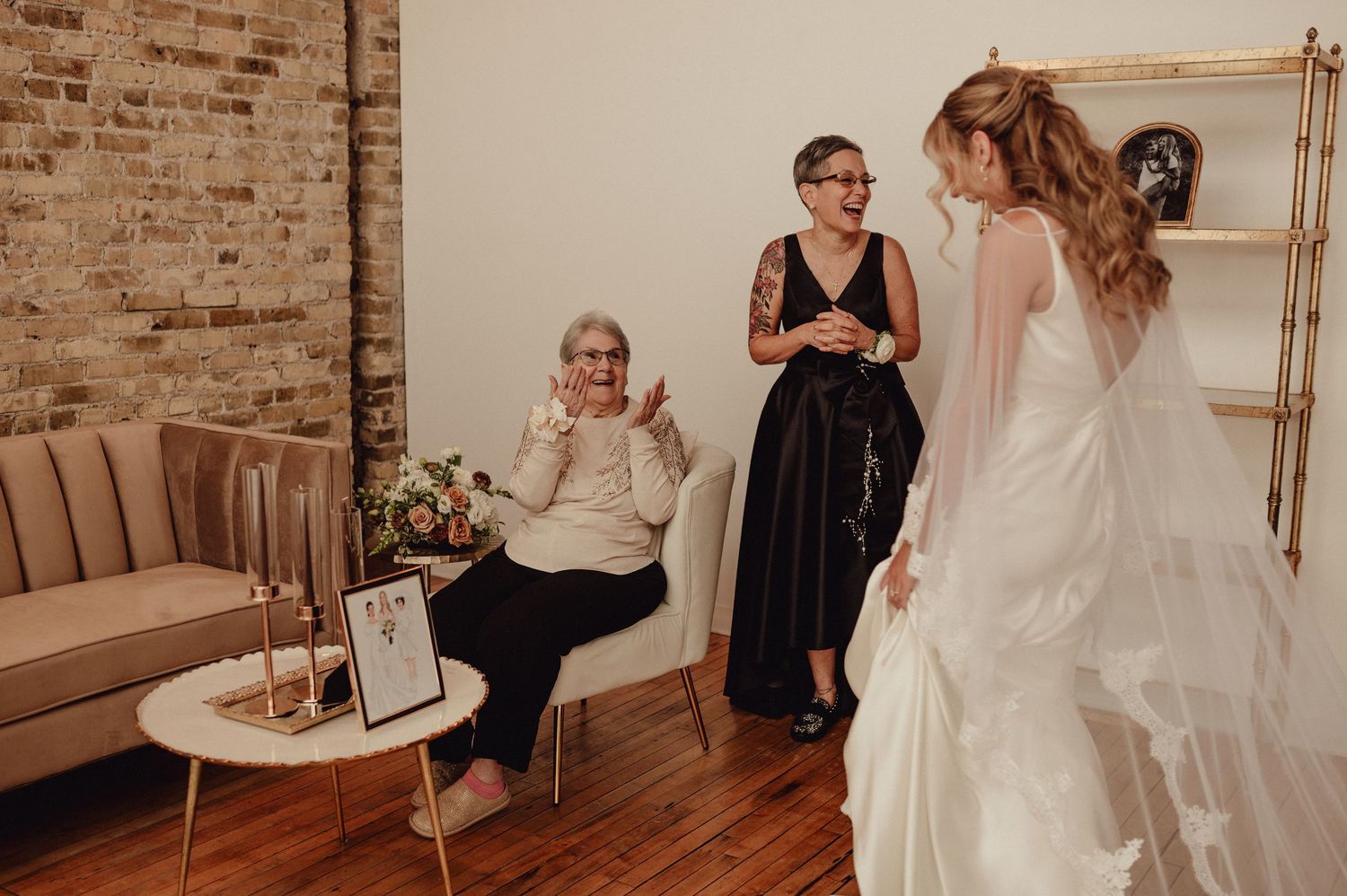 A wedding celebration in a rustic brick-walled venue with elegant decor and festive moments captured in multiple frames.