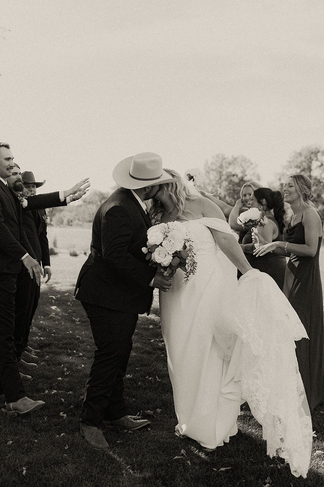 Vintage style black and white photos capturing intimate wedding dance moments outdoors.
