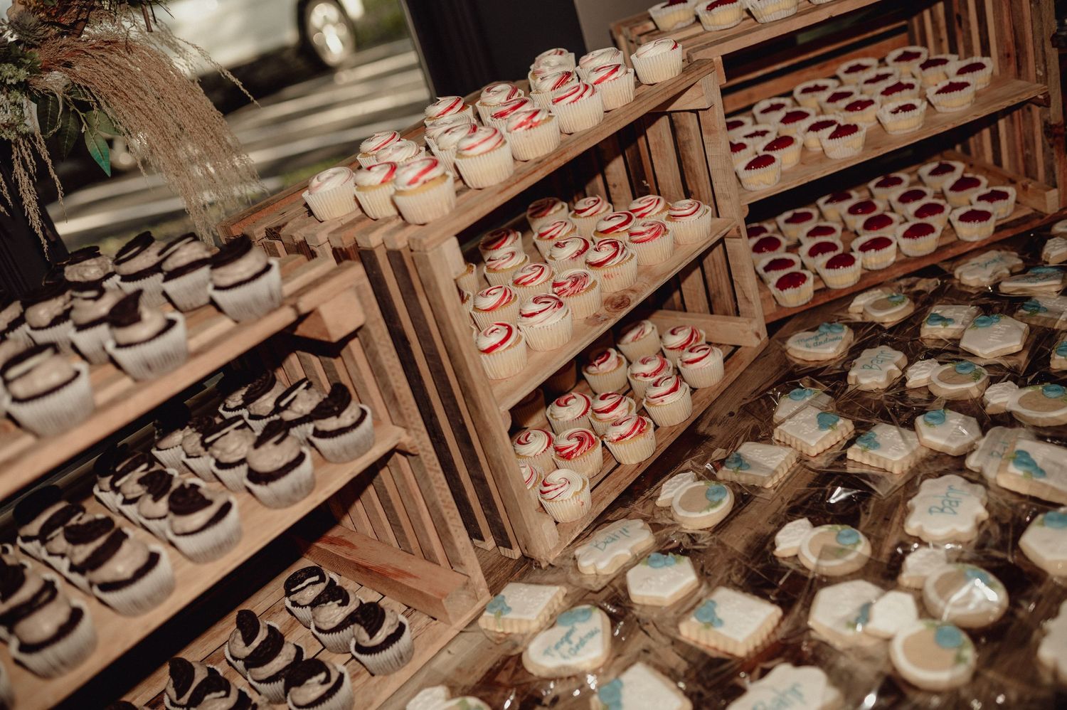 Rows of traditional wooden shoe lasts in a shoemaker's workshop display vintage cobbler tools and craftsmanship.