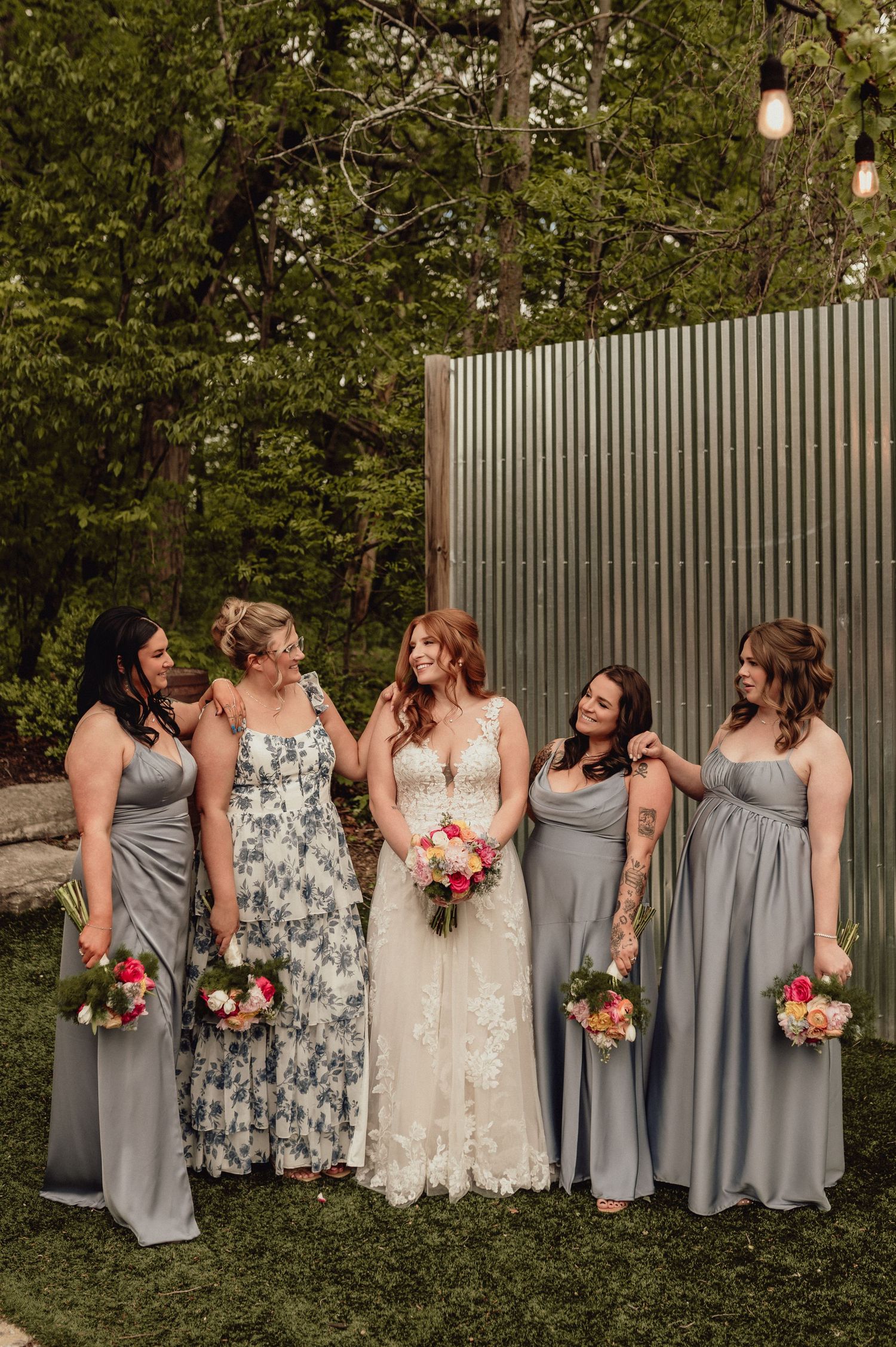 Candid wedding party photo series showing bridesmaids in gray dresses and bride in white lace gown with pink bouquets.