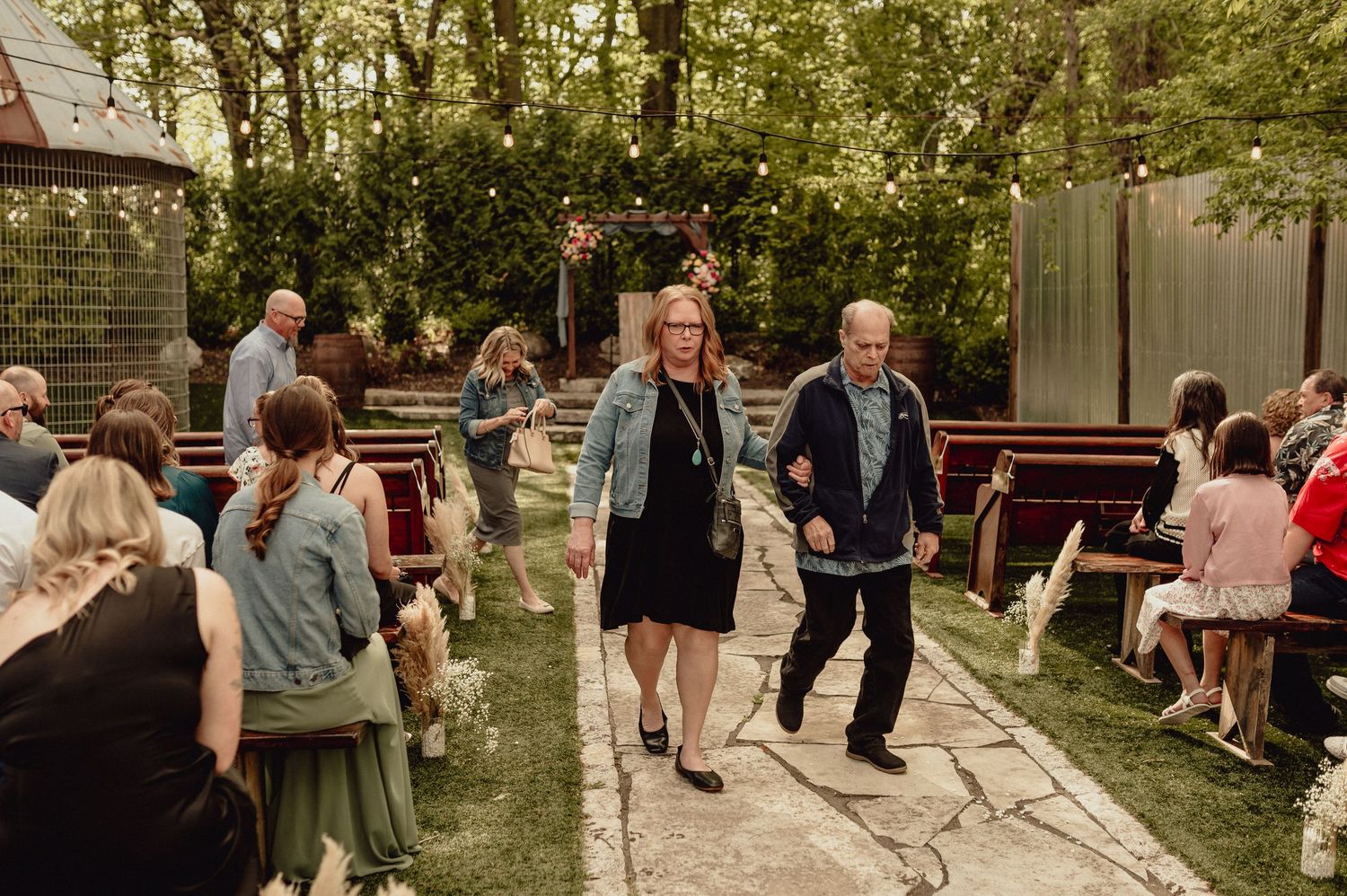 A sequence of candid moments from an outdoor garden party celebration with guests mingling and socializing.