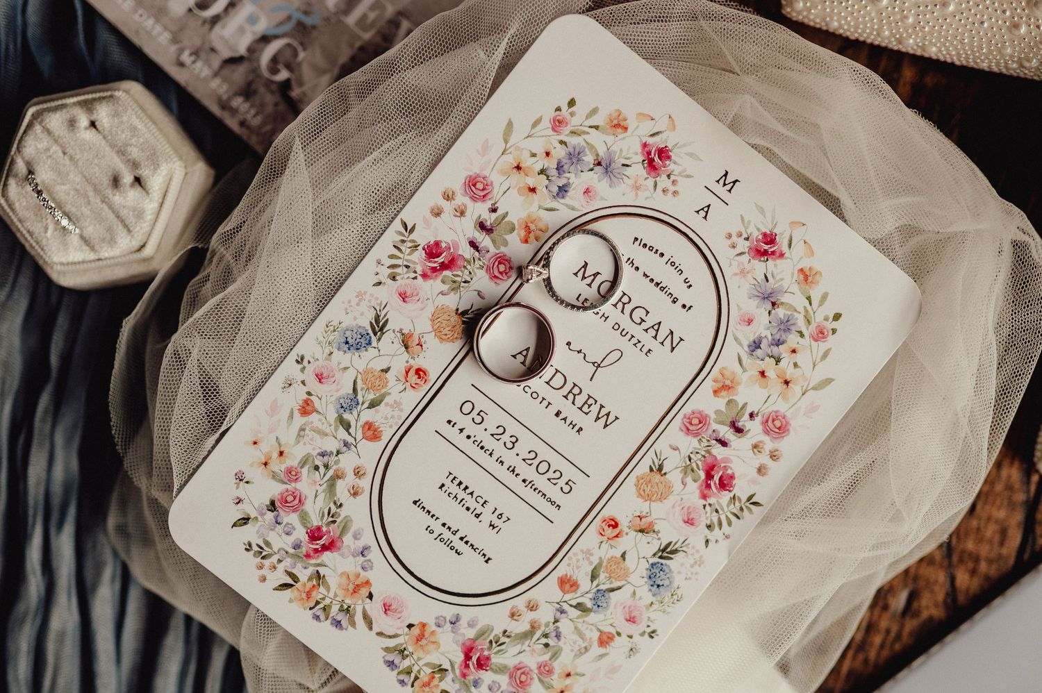 Floral decorated soap or beauty product packaging with delicate pink and blue flowers on a white background.