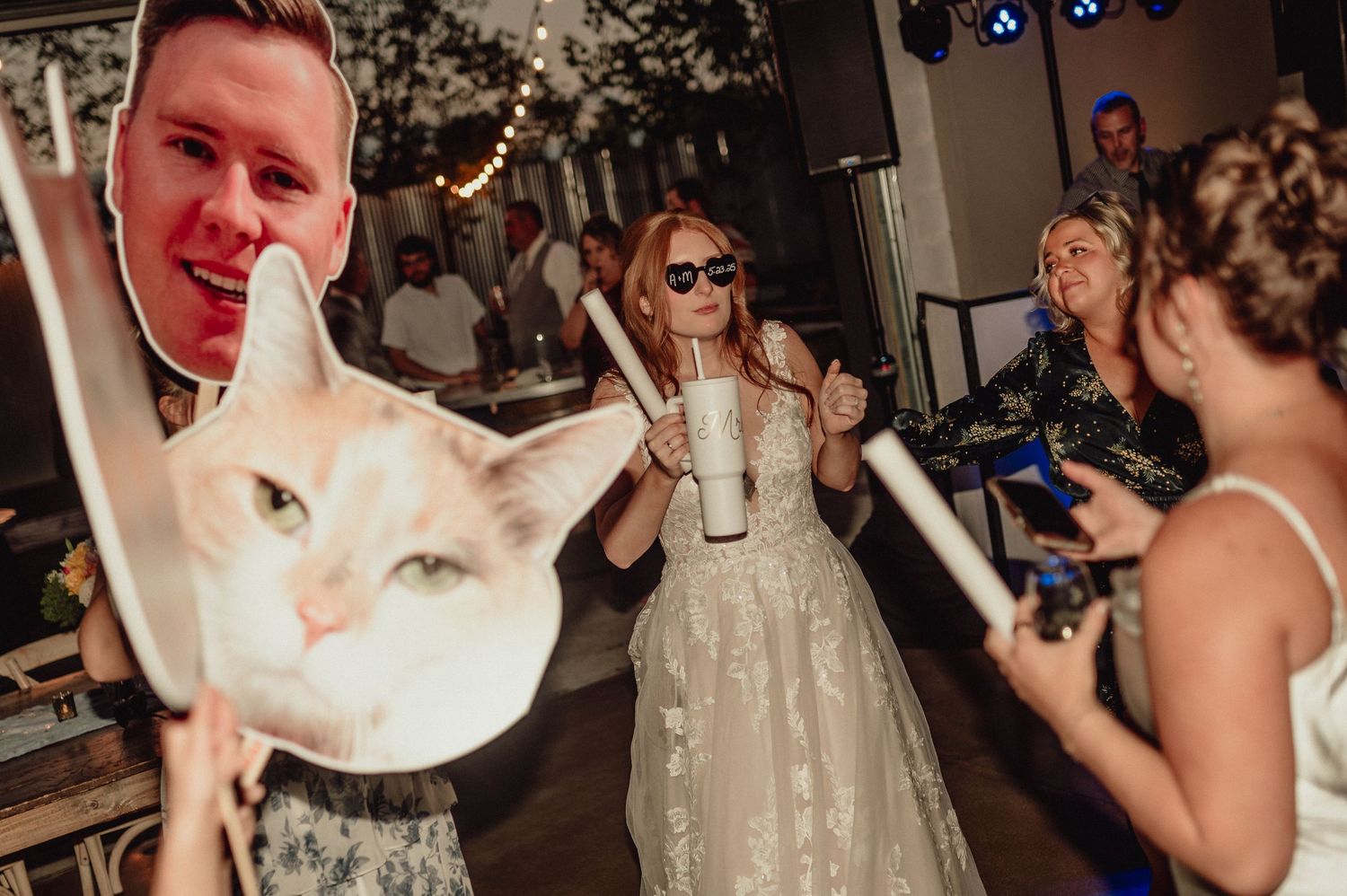 A collage of candid wedding reception photos showing dancing guests and celebrations at an indoor venue.