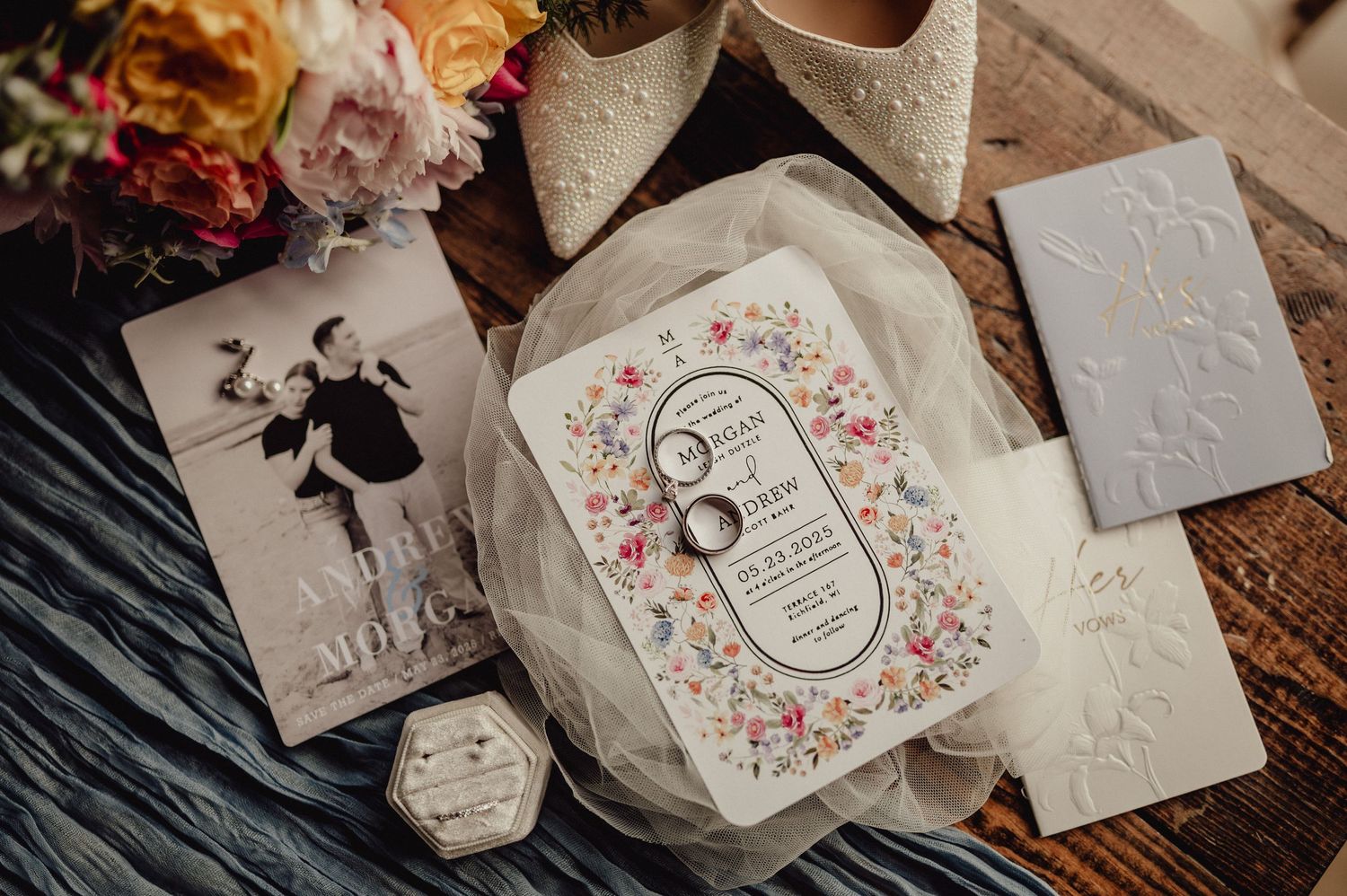 Vintage wedding stationery collection with delicate floral designs and calligraphy on textured paper.