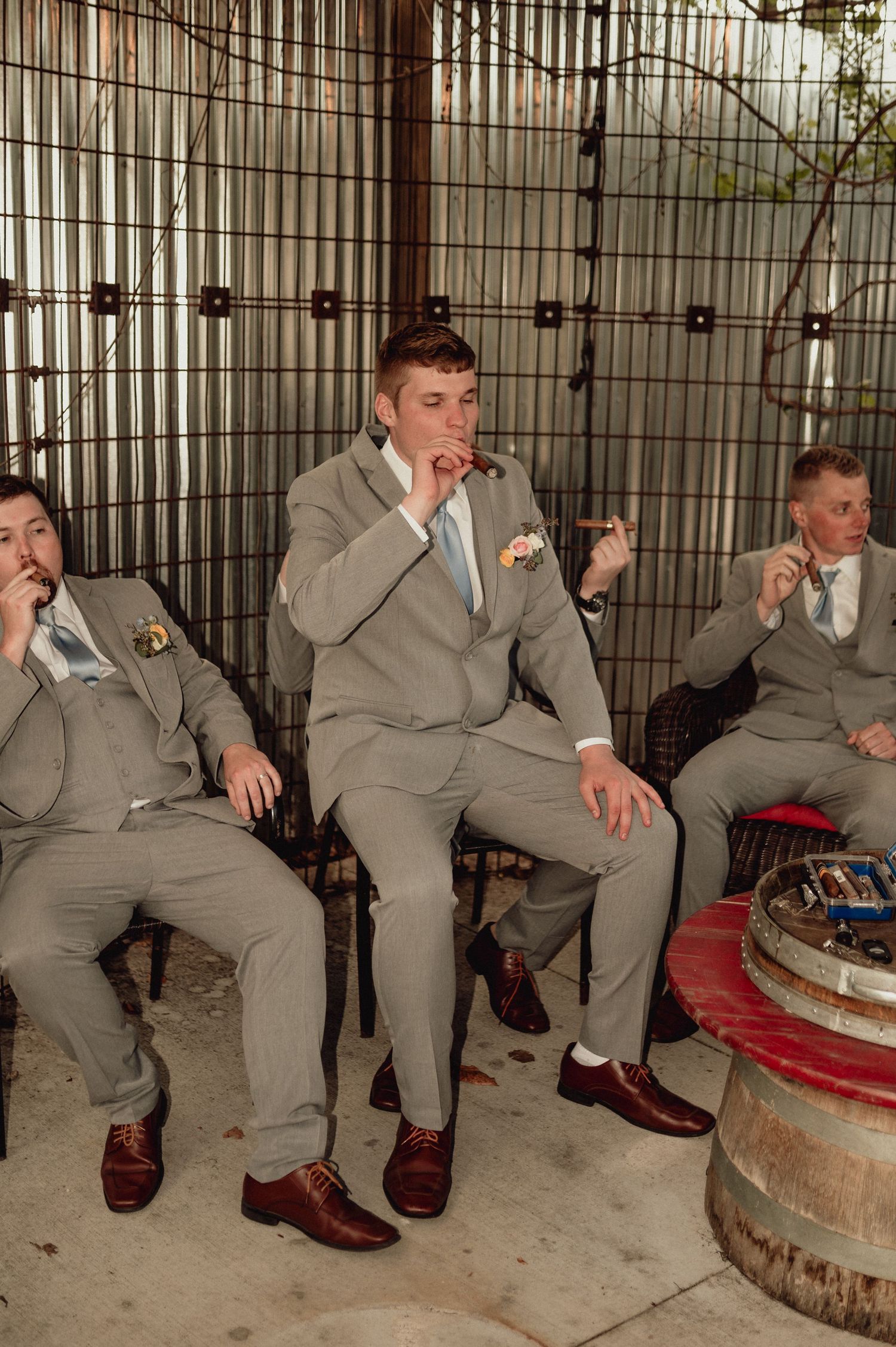 A sequence of photos showing a person in a gray suit sliding down against a wall in a humorous progression.
