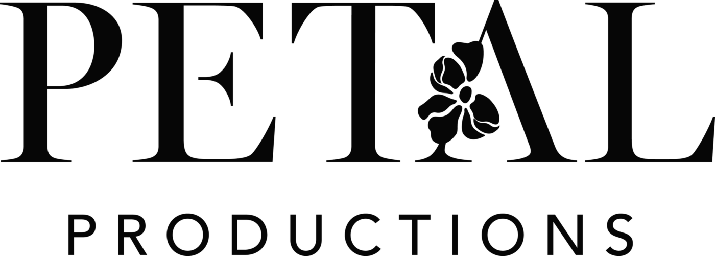 Elegant black text logo design for Petal Productions with floral accent.
