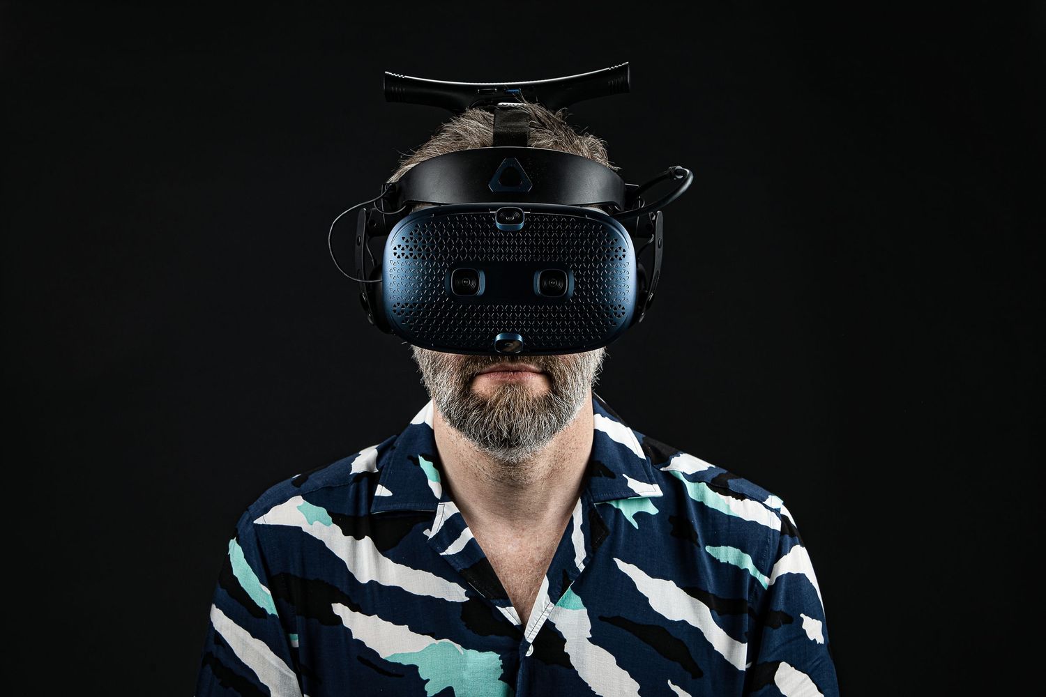 A sequence of images showing someone wearing a VR headset viewed from different angles against a dark background.